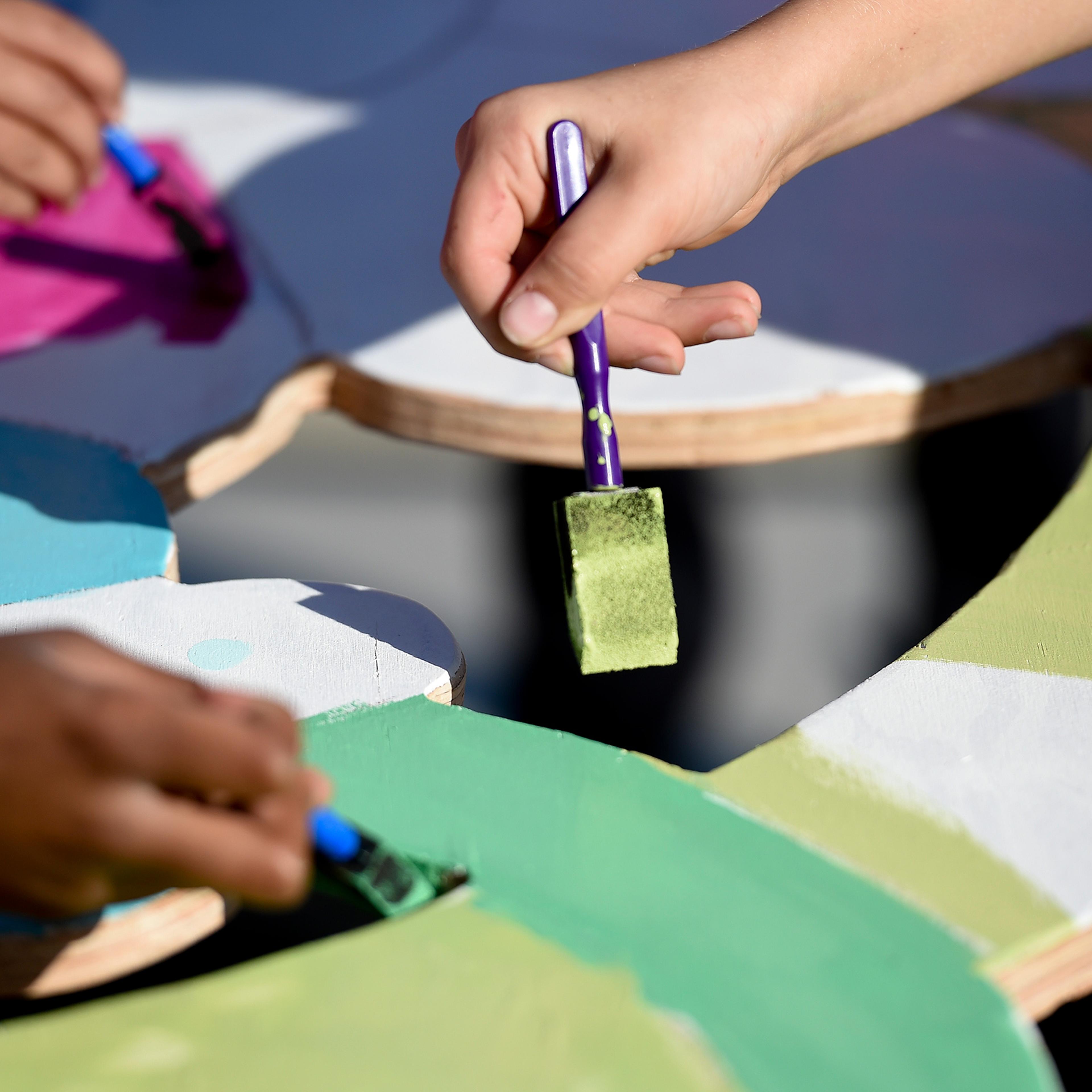 Students paint at Mifflin Park Elementary School in Cumru Township, Penn., on Oct. 7.