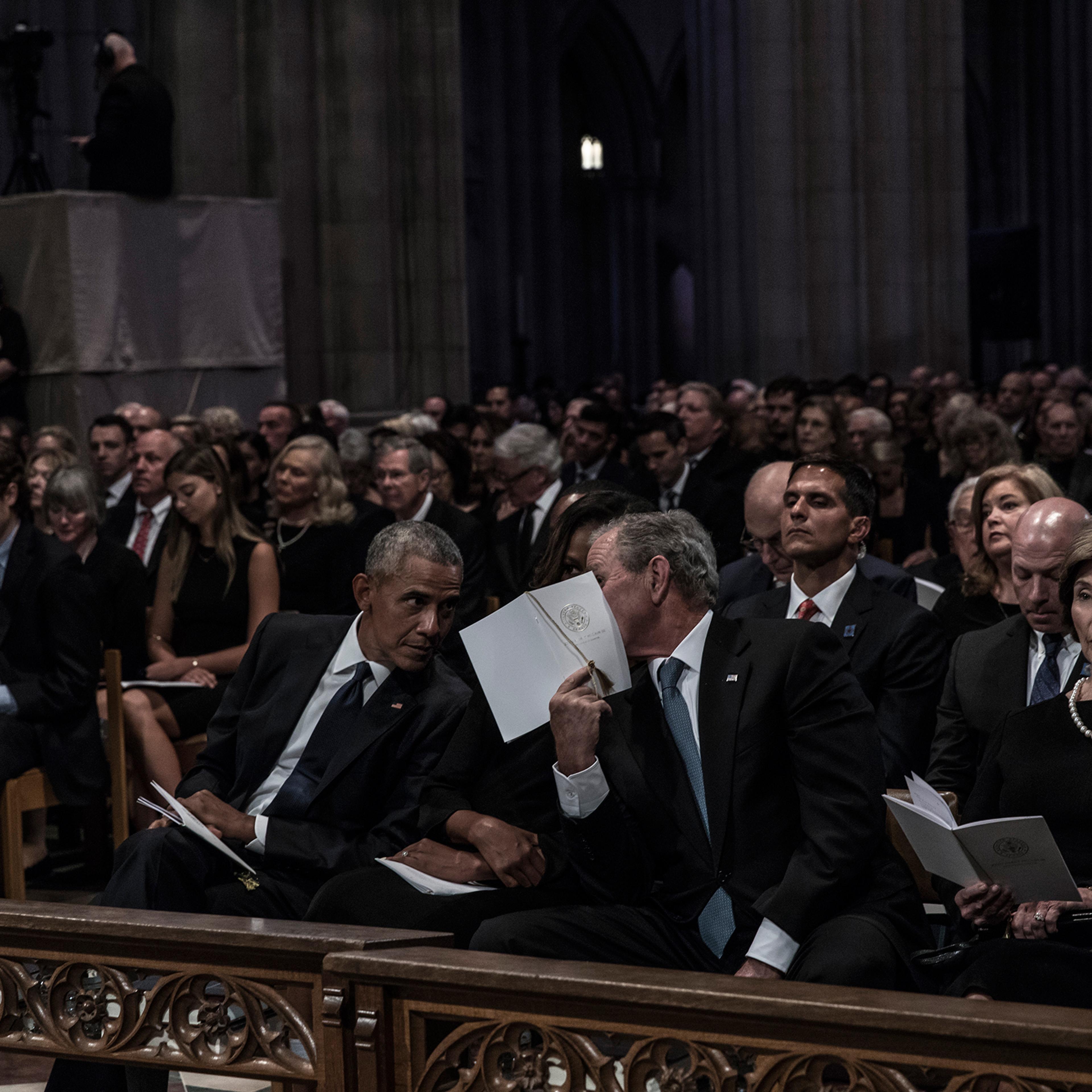 Former US President Barack Obama, Michelle Obama, former President George W. Bush and Laura Bush during a memorial service for Senator John McCain at the Washington National Cathedral on September 1, 2018.