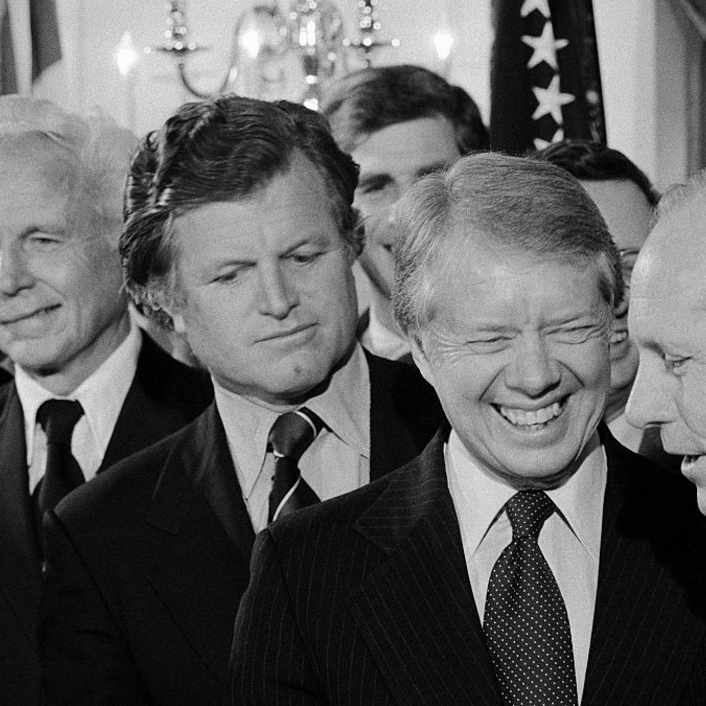 Edward Kennedy Looking on near Jimmy Carter