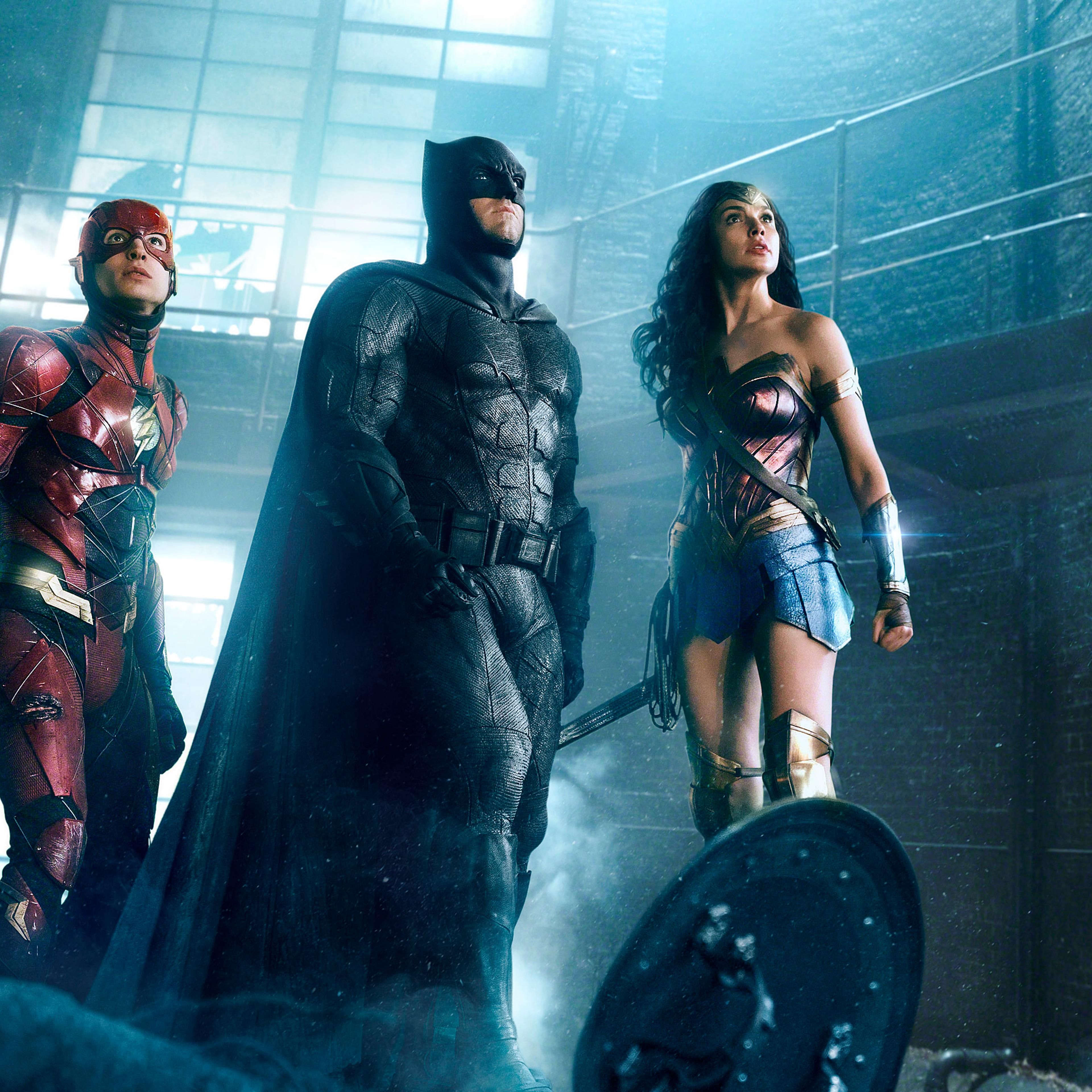Ezra Miller as The Flash, Ben Affleck as Batman, and Gal Gadot as Wonder Woman in Justice League