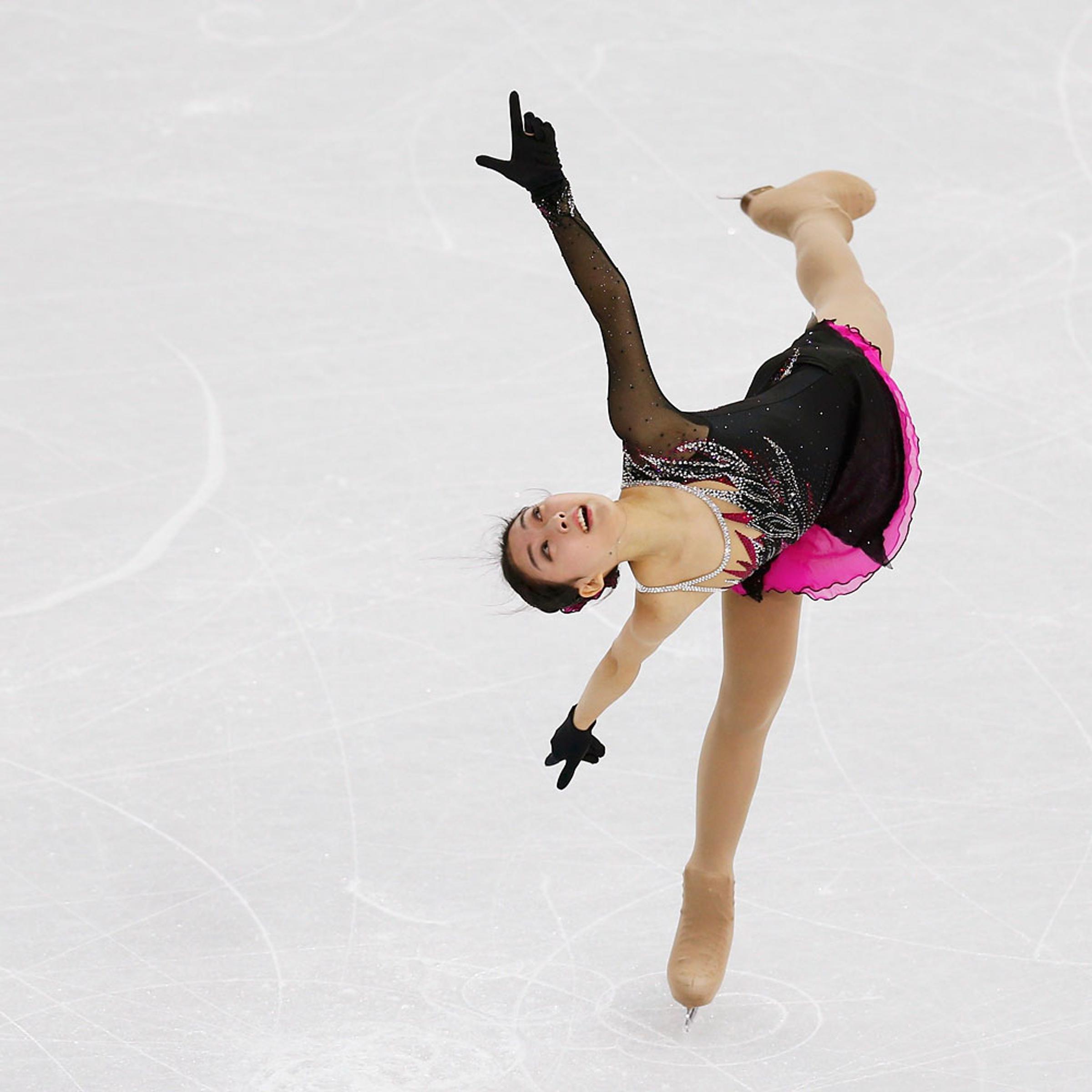 China's Zijun Li competes during the Figure Skating Women's Short Program at the Sochi 2014 Winter Olympics