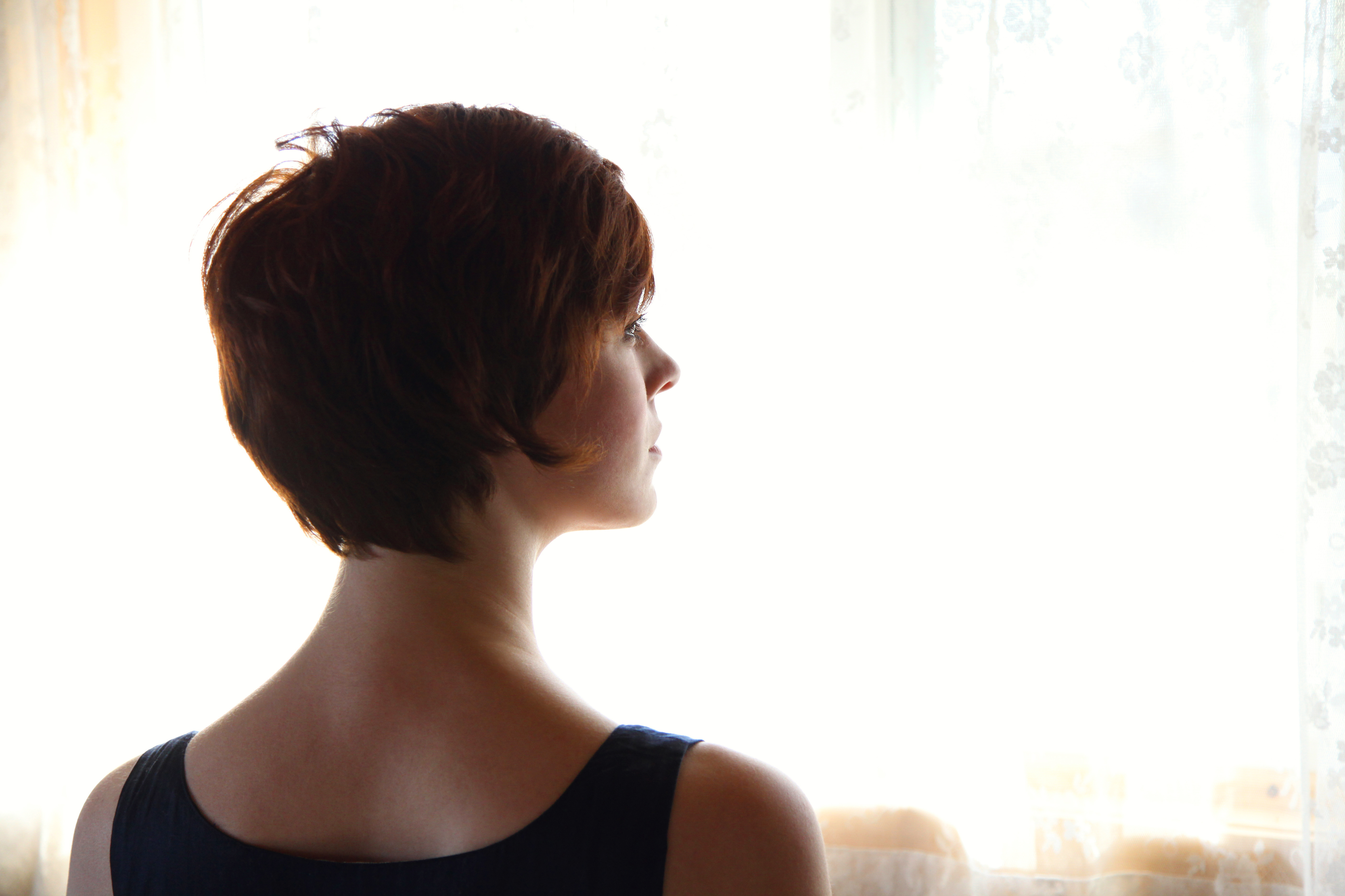 woman-rear-view-looking-thinking