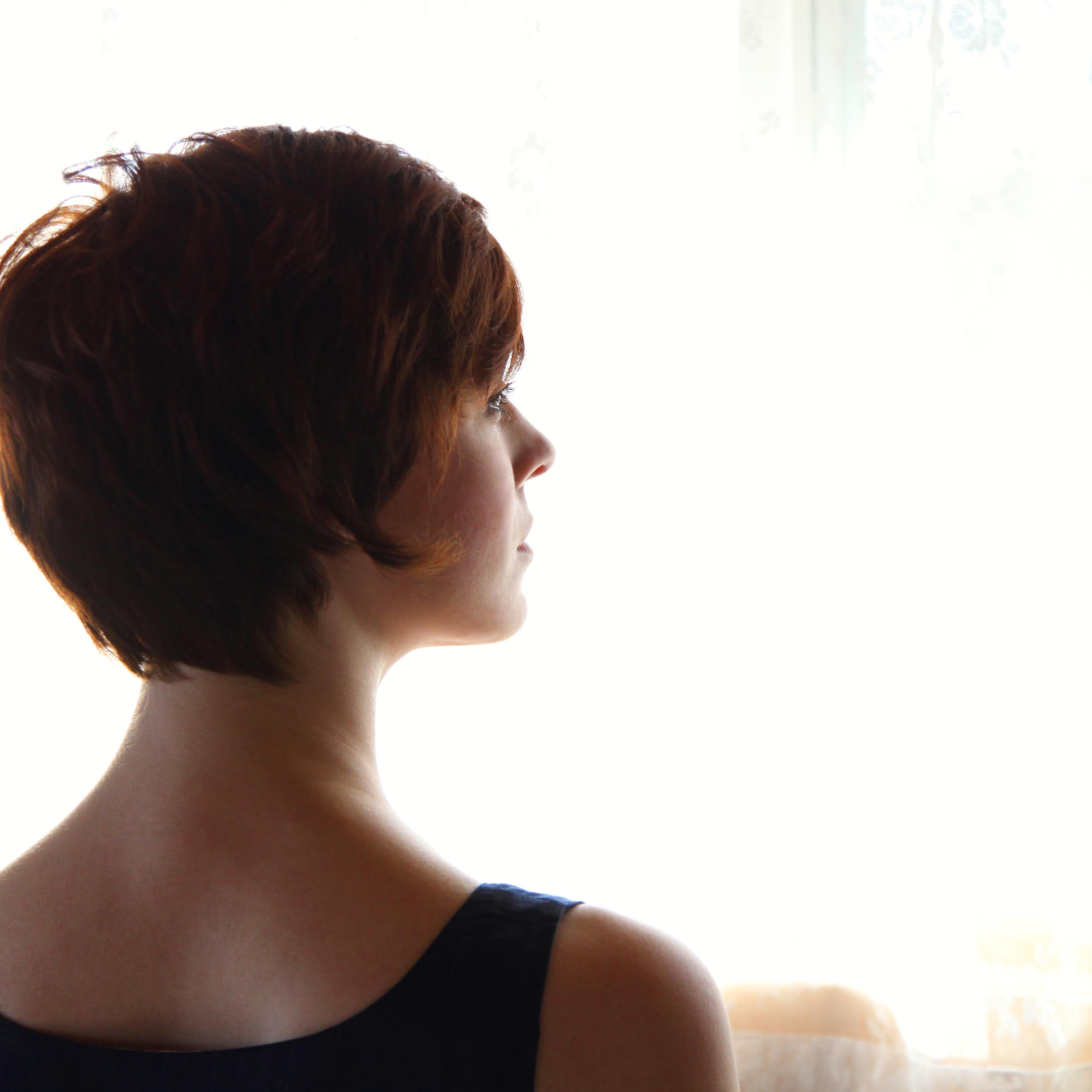 woman-rear-view-looking-thinking