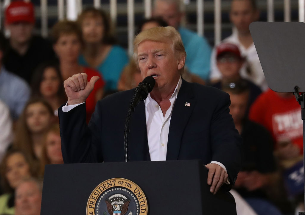 President Donald Trump arrives for a campaign rally at the AeroMod International hangar at Orlando Melbourne International Airport on February 18, 2017 in Melbourne, Florida. President Trump is holding his rally as he continues to try to push his agenda 