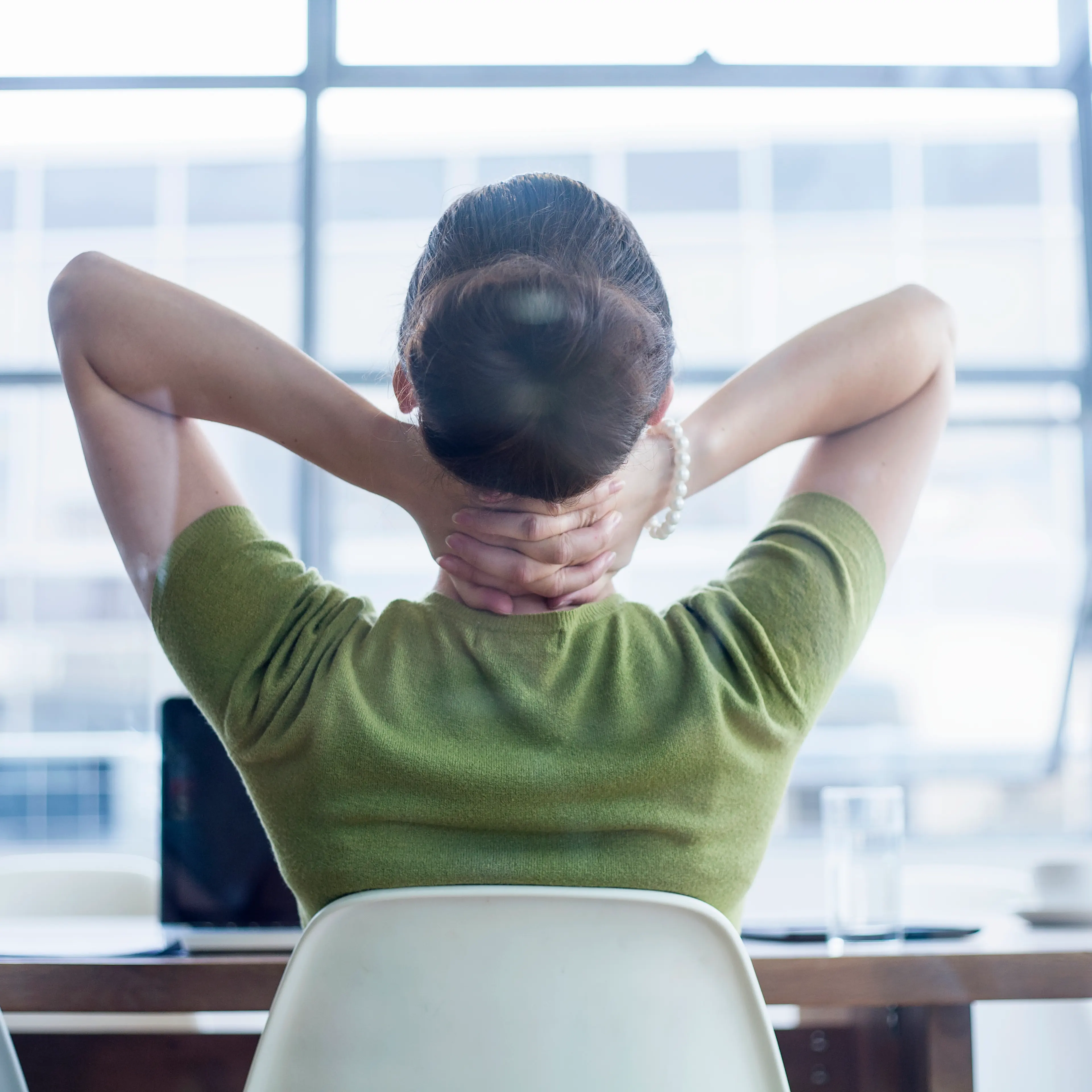 woman-desk-neck-stretching