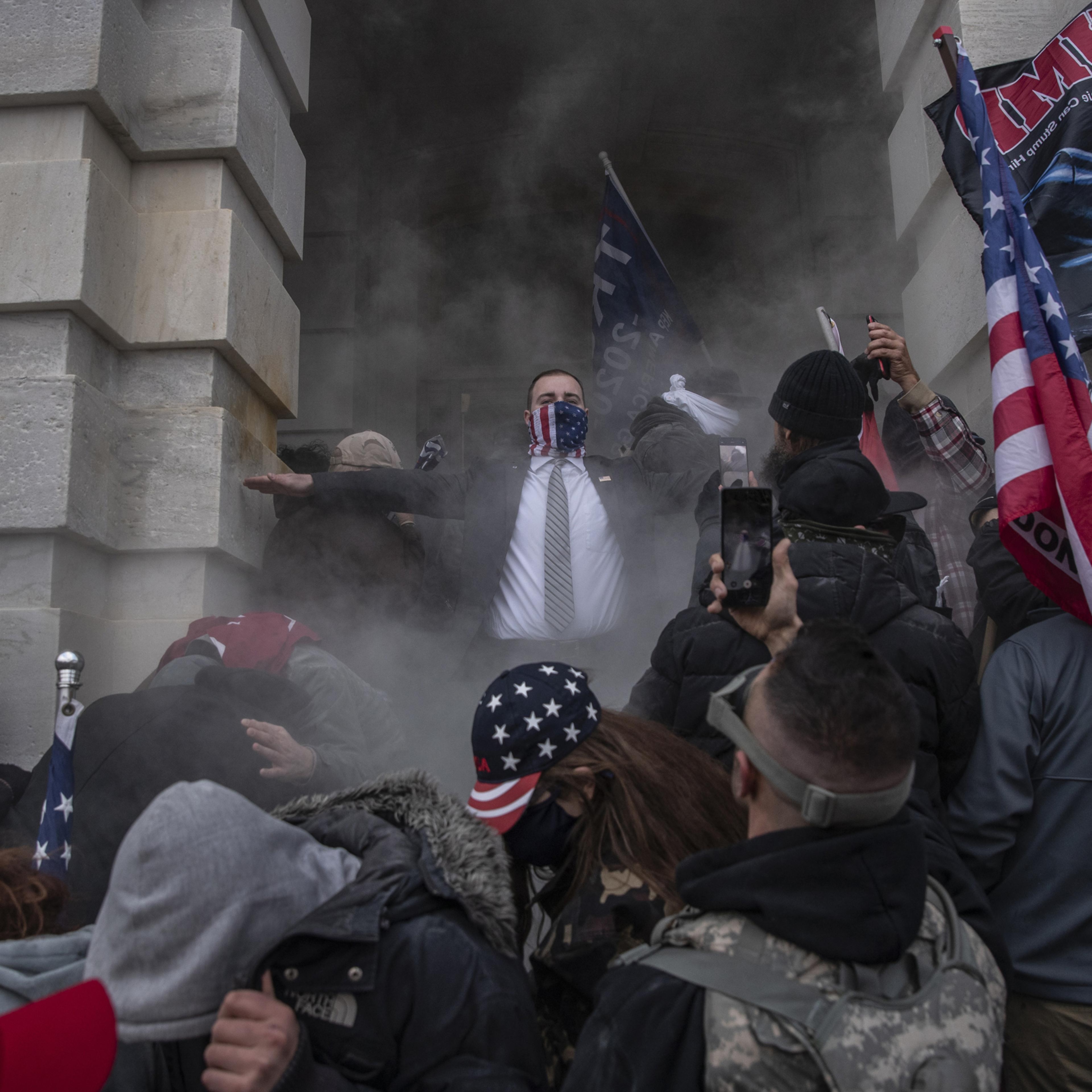 Demonstrators attempt to breach the U.S. Capitol after they stormed past barricades on Jan. 6