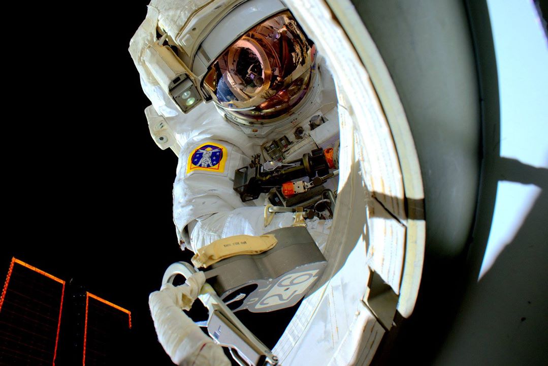 Astronaut Scott Kelly, re-entering the International Space Station after his spacewalk on Oct. 29, 2015.