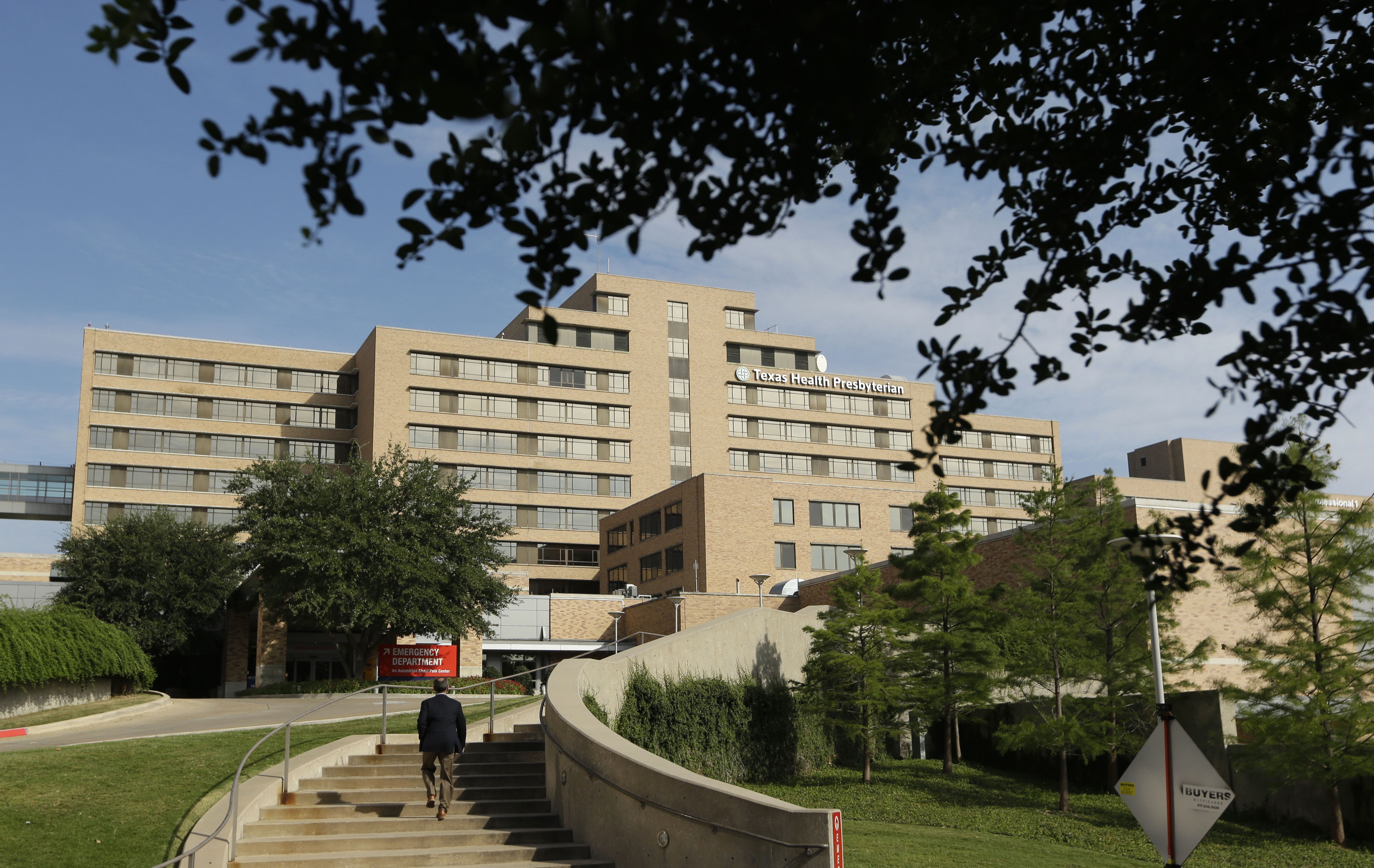 A man walks up the stairway leading to the Texas Health Presbyterian Hospital in Dallas, Sept. 30, 2014.