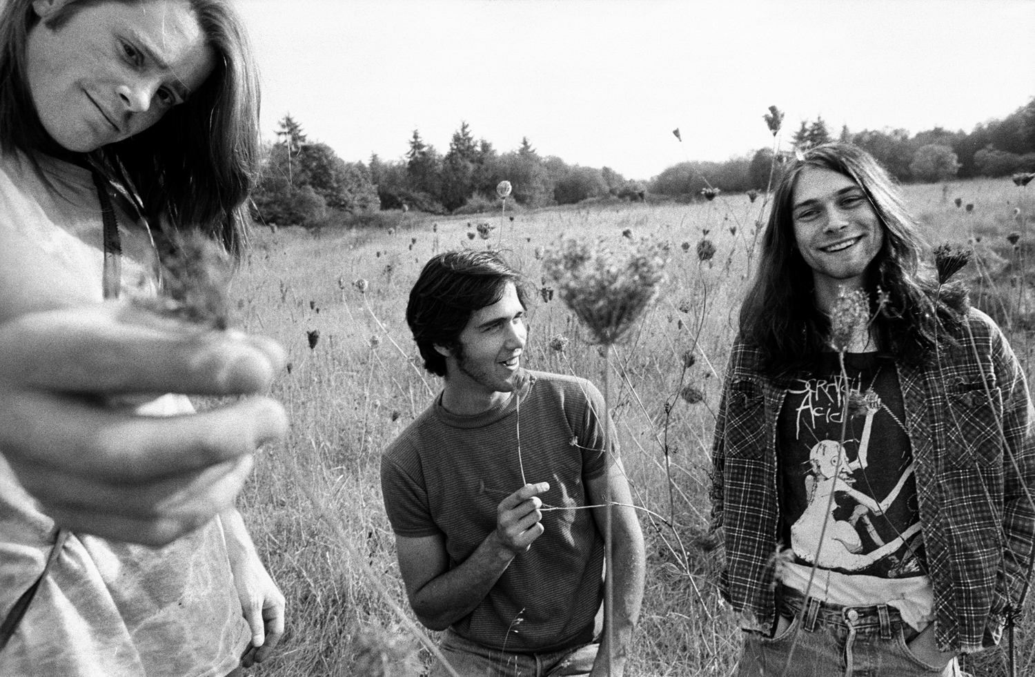 Nirvana in 1988: Chad Channing (left), Krist Novoselic (middle) and Kurt Cobain (right). Dave Grohl replaced Channing on drums after Nirvana's 1989 debut album, Bleach, was released on Sub Pop.