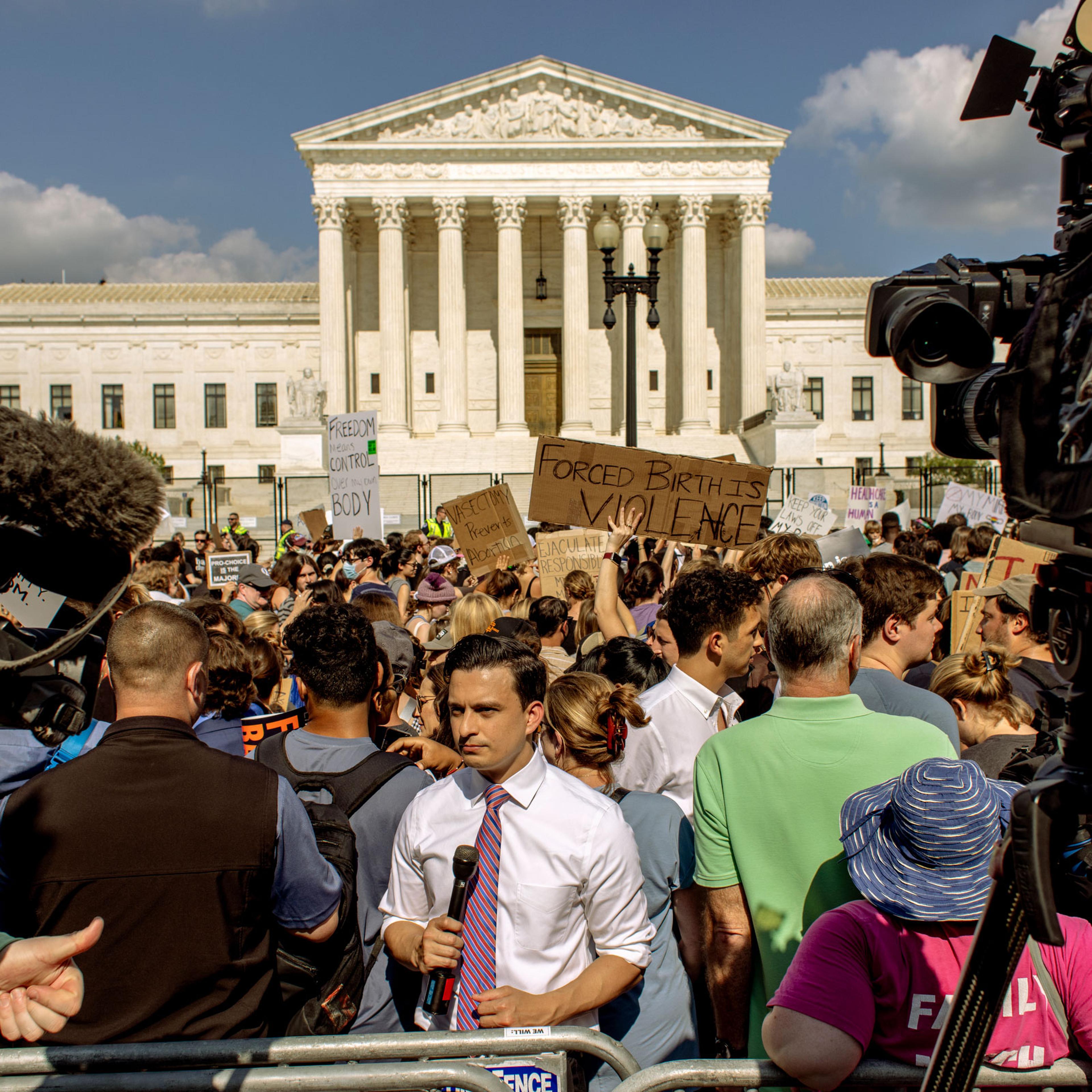 People gather to protest in front of the Supreme Court following their 5-4 decision to overturn Roe v Wade on June 24, 2022 in Washington, D.C.