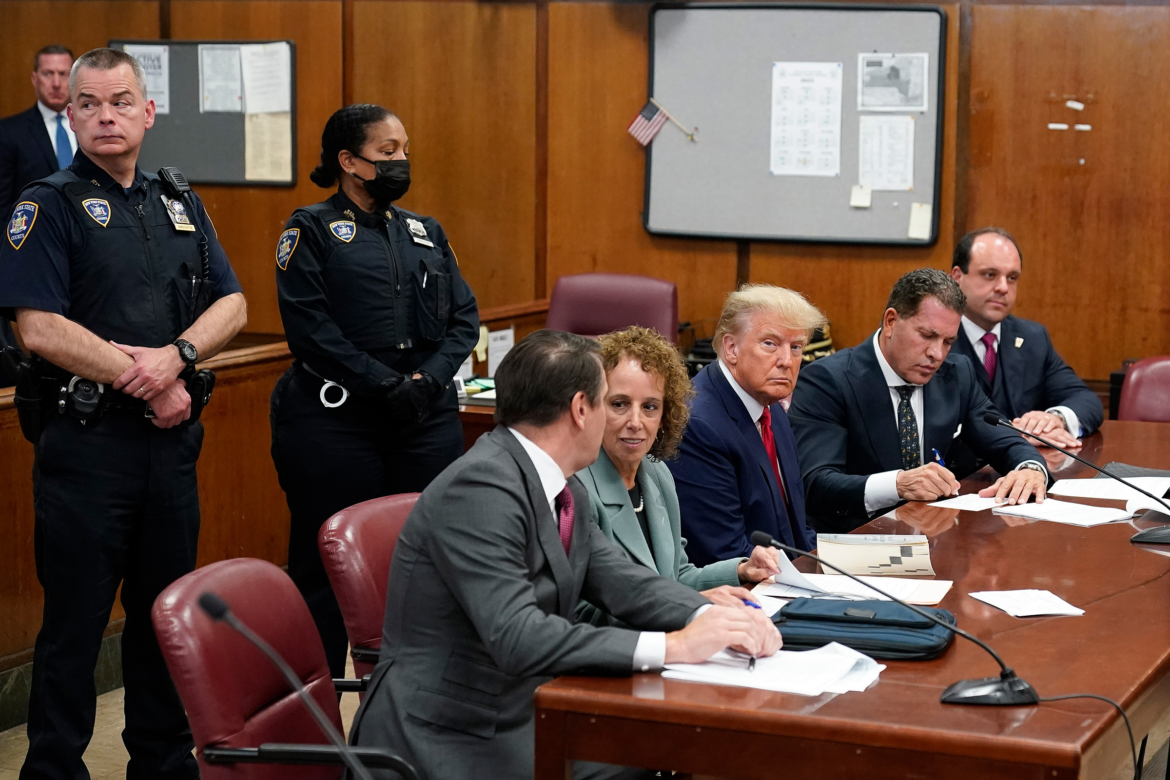 Former President Donald Trump sits at the defense table with his defense team in a Manhattan court April 4, 2023, in New York.