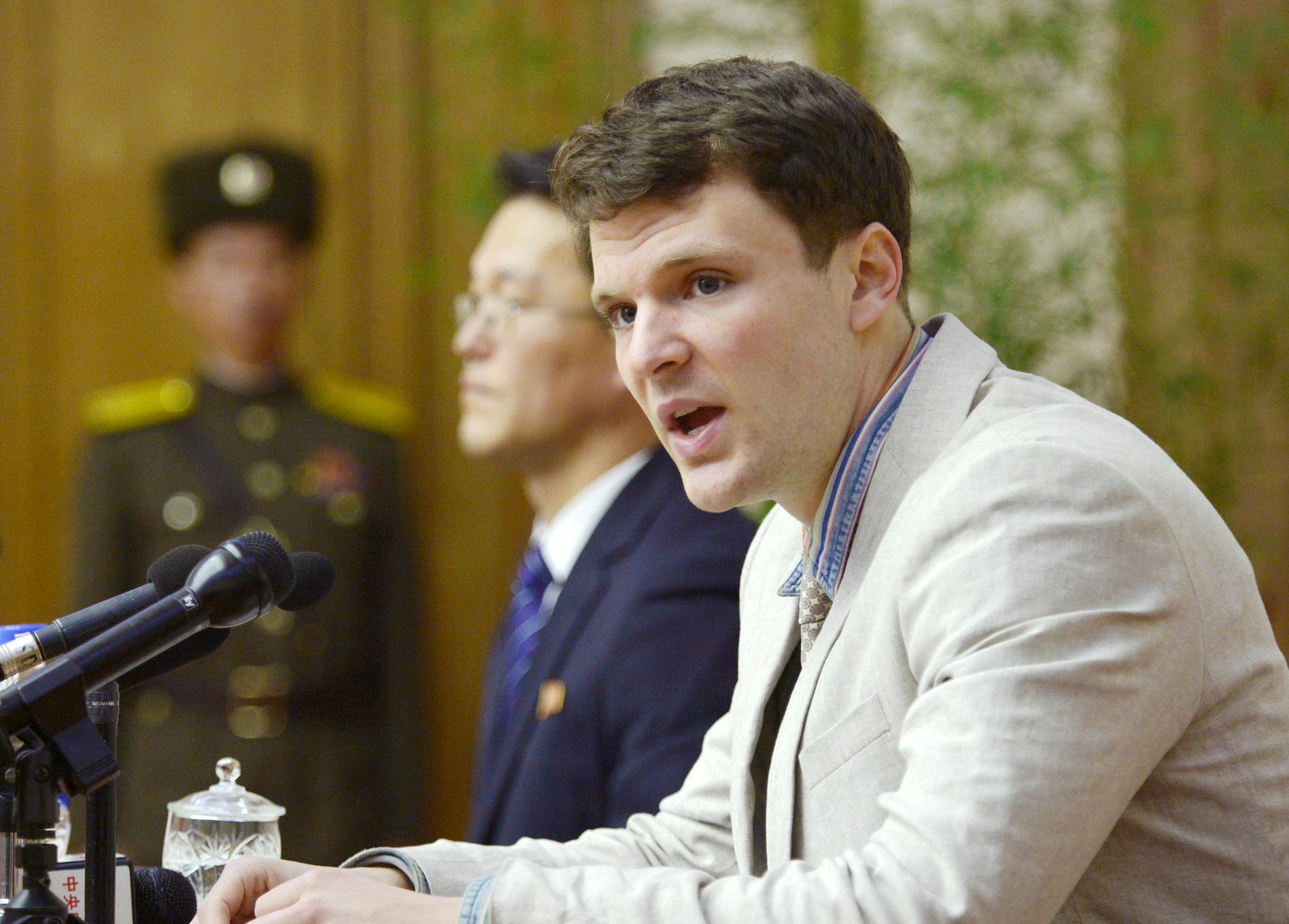 FILE PHOTO - Otto Warmbier attends a new conference in Pyongyang North Korea