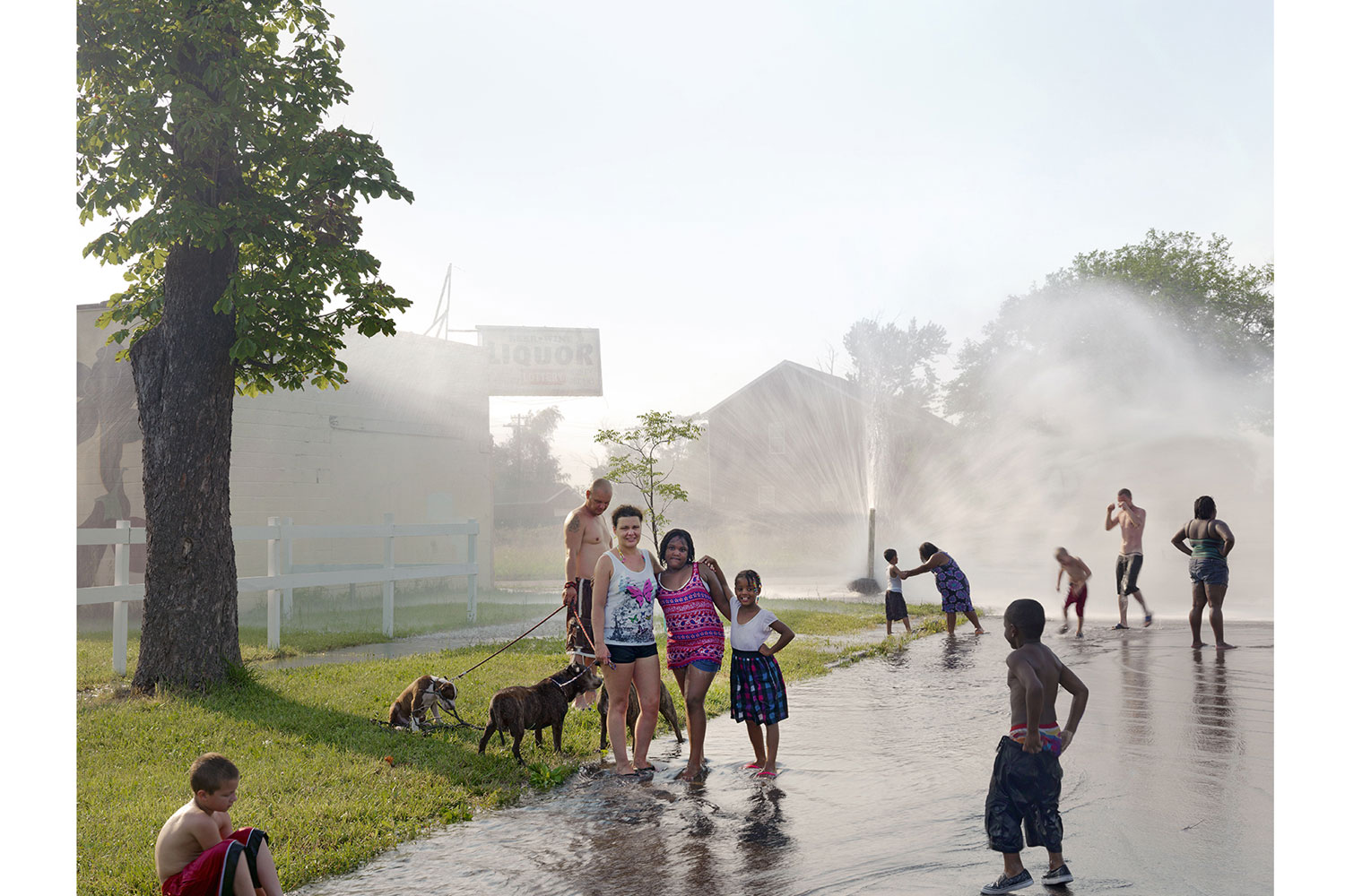<i>A Neighborhood Group Playing in the Street</i>, North Corktown, Detroit, 2012
<br /><br />
<i>The temperature hit 103 degrees on this July day, forcing many neighborhood residents to open up fire hydrants to relieve themselves from the sweltering heat.</i>