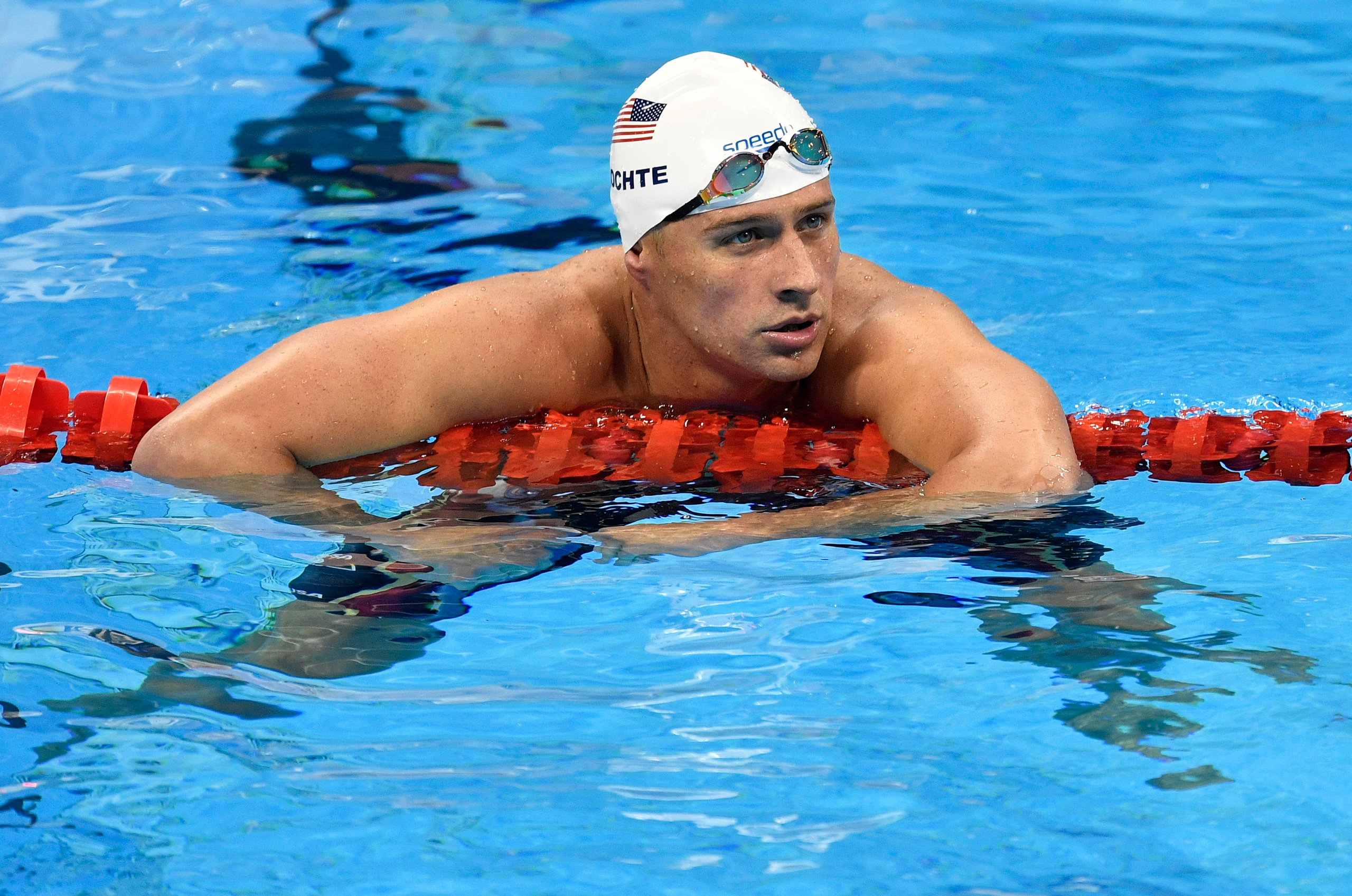 FILE - In this Aug. 9, 2016, file photo, United States' Ryan Lochte checks his time after a men' 4x200-meter freestyle relay heat during the swimming competitions at the 2016 Summer Olympics in Rio de Janeiro, Brazil. A Brazilian police official told The