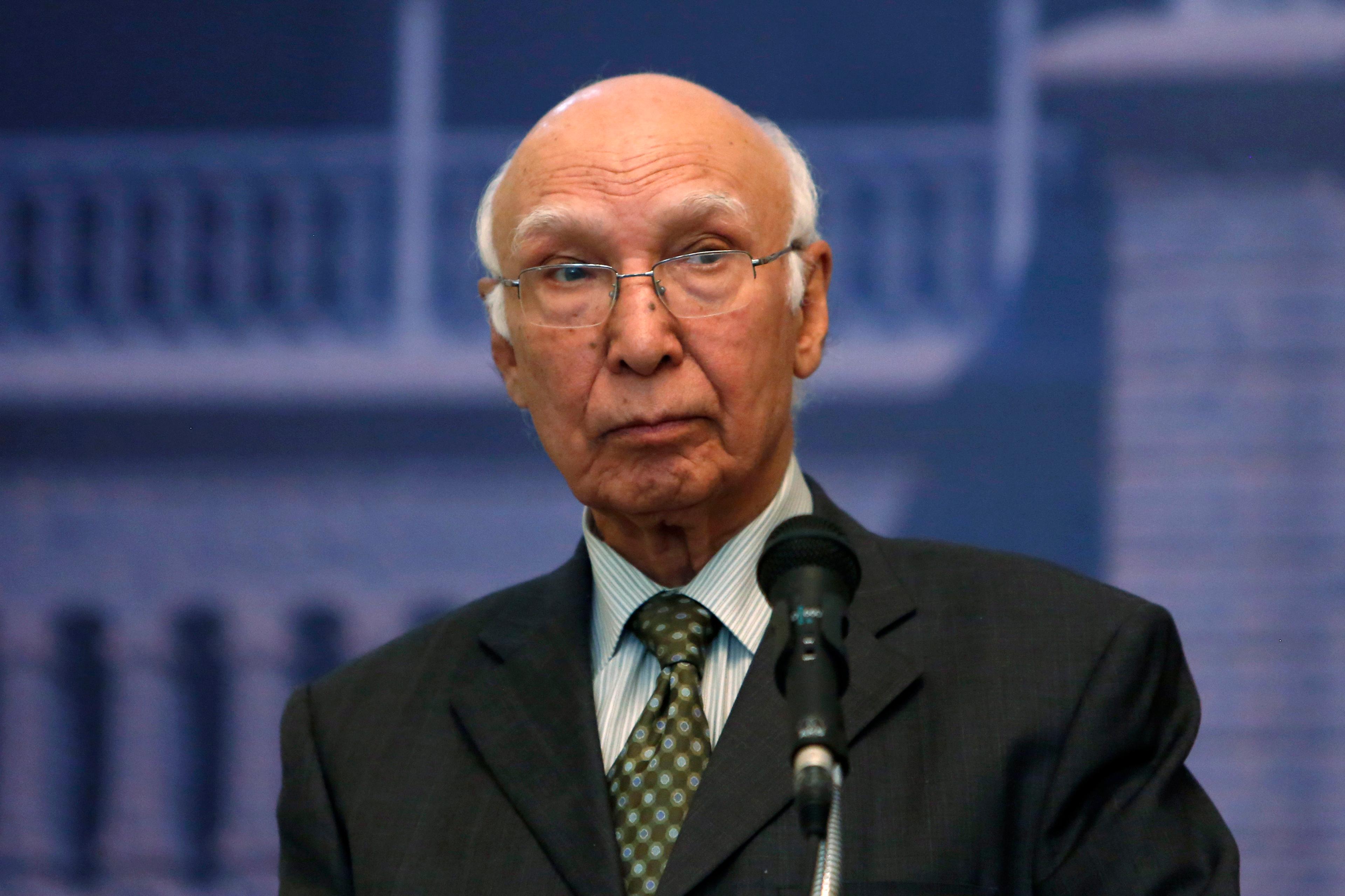 Pakistan's new foreign policy chief Aziz speaks during a news conference in Kabul