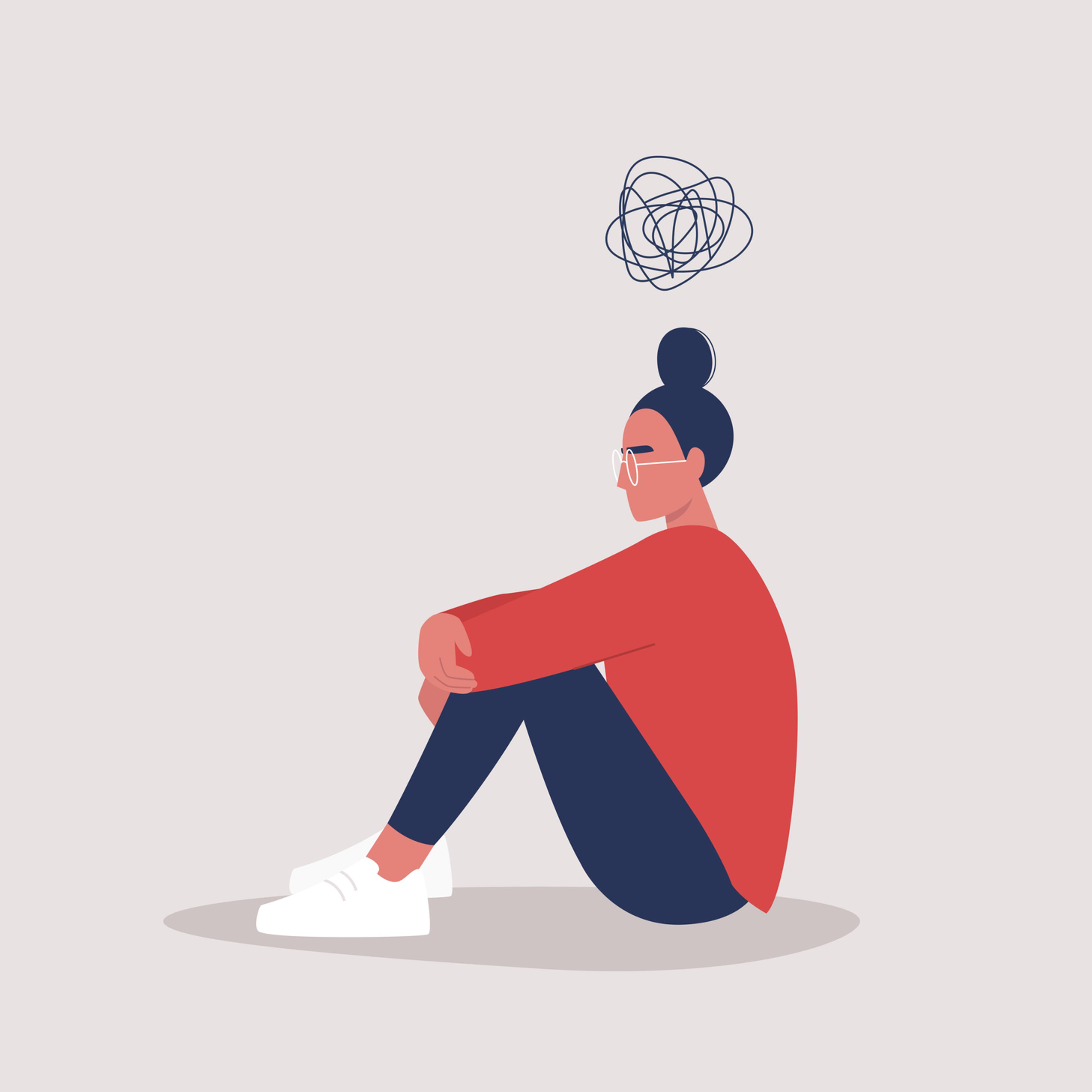 Young depressed female character sitting on the floor and holding their knees, a cartoon scribble above their head, mental health issues