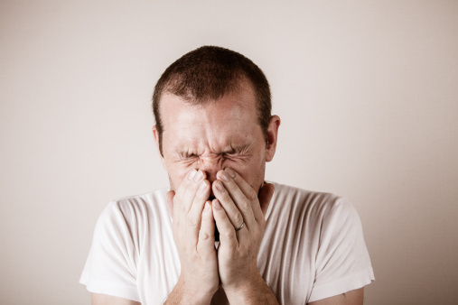 man-sneezing