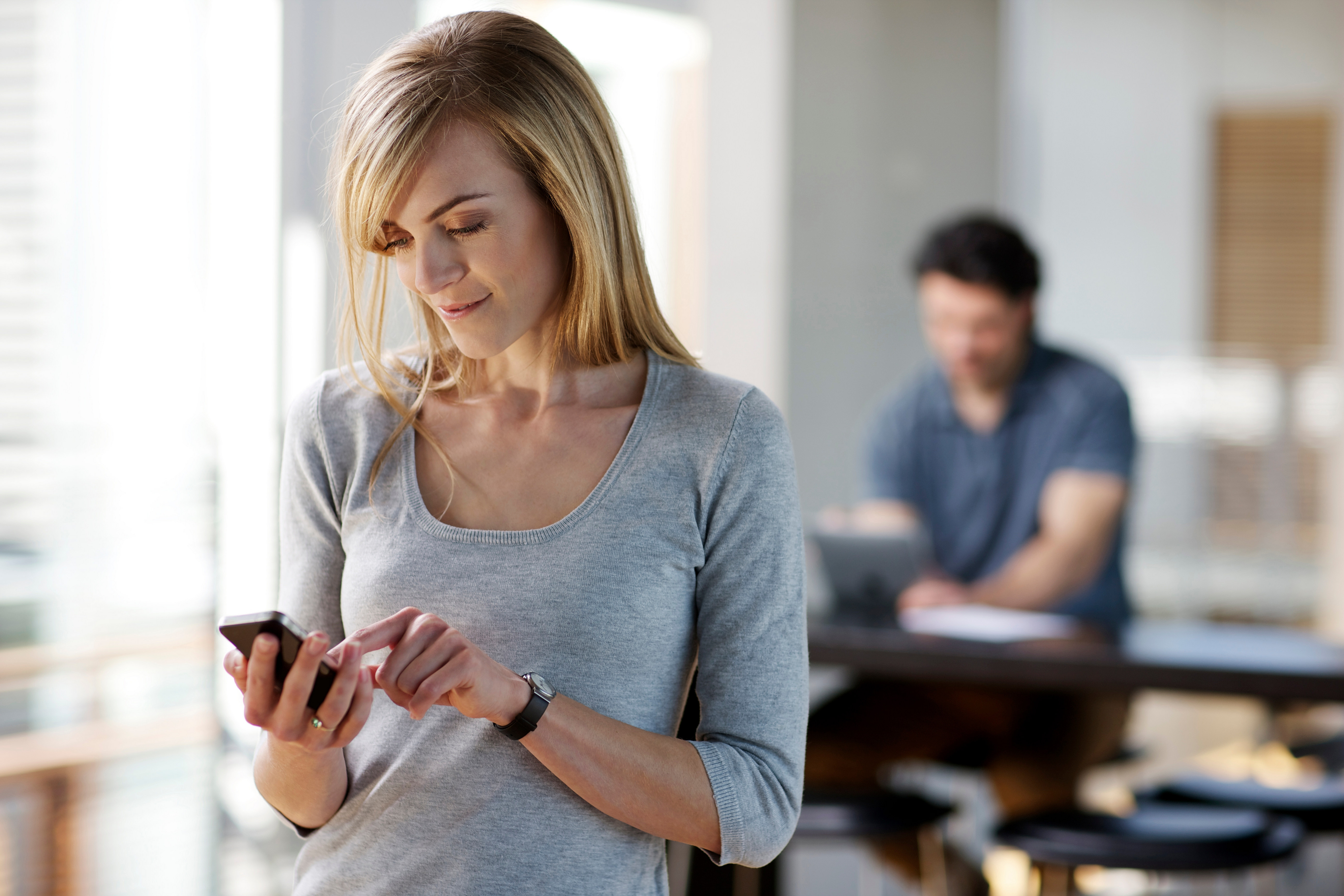 Woman using iPhone
