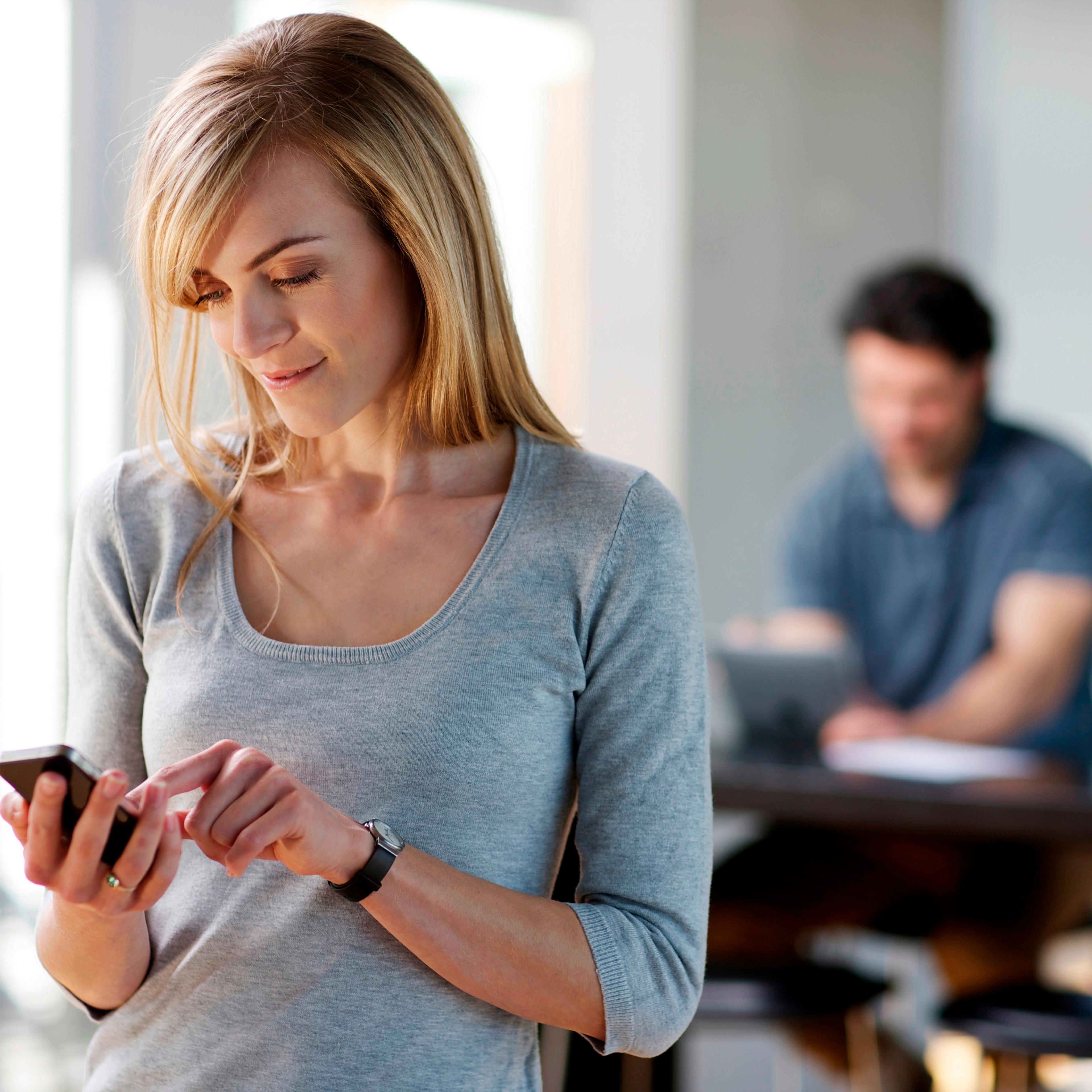 Woman using iPhone