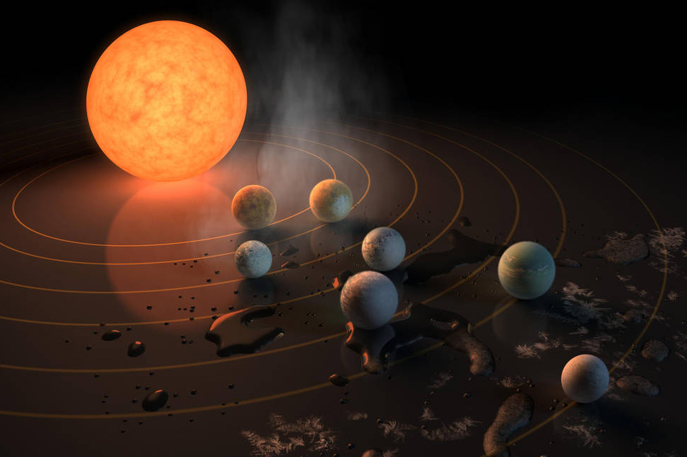 This artist's concept appeared on the Feb. 23, 2017 cover of the journal Nature, announcing that the TRAPPIST-1 star has seven Earth-size planets orbiting it.