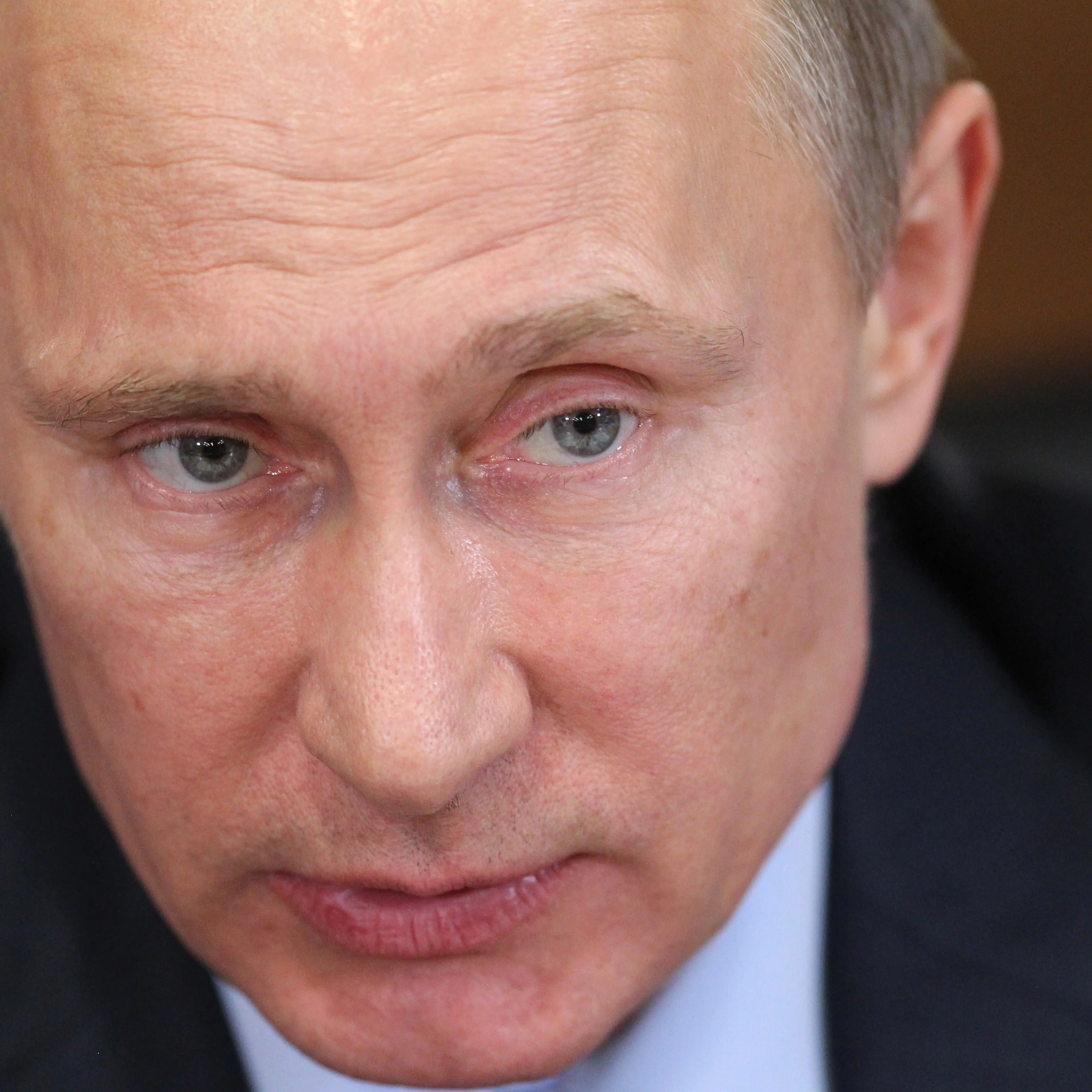 Russian President Vladimir Putin attends a meeting with ministers from the Federal Financial Monitoring Service (Rosfinmonitoring) to discuss the fight against money laundering on March 4, 2014 in Moscow, Russia.