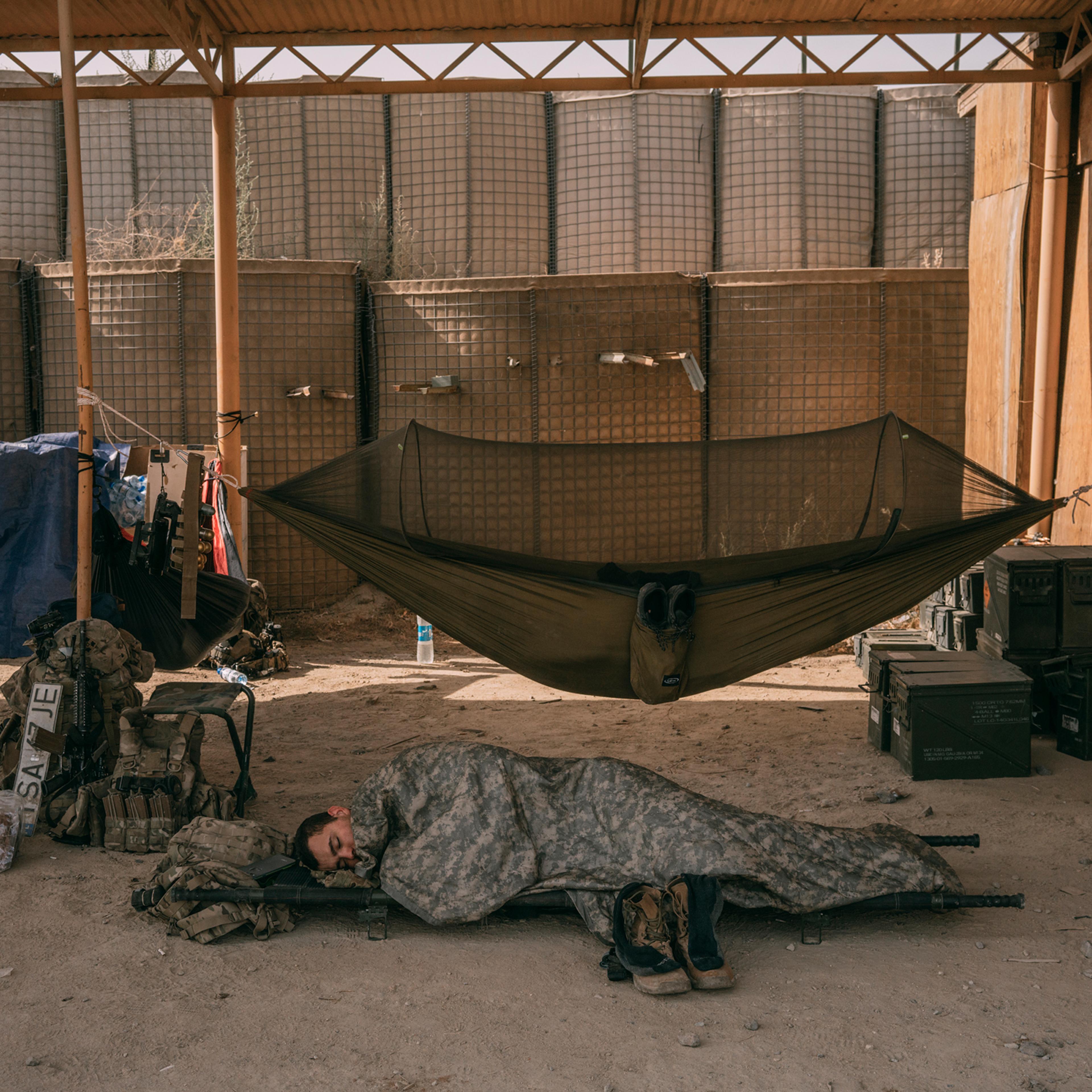 An American soldier sleeps at a military outpost in Ghazni, Afghanistan, in August 2018.