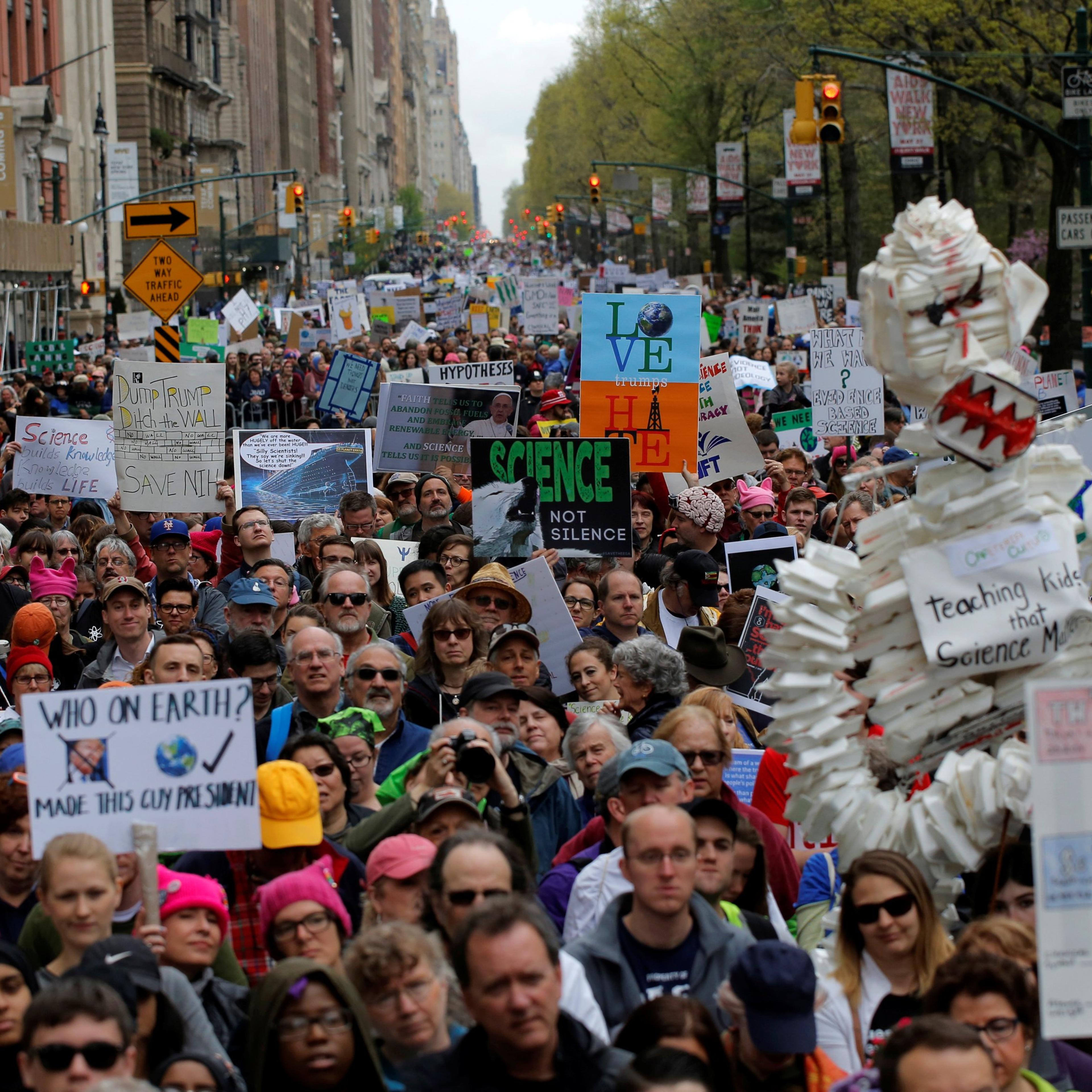 Protesters line Central Park West during the Earth Day 'March For Science NYC' demonstration to coincide with similar marches globally in Manhattan, New York, U.S.
