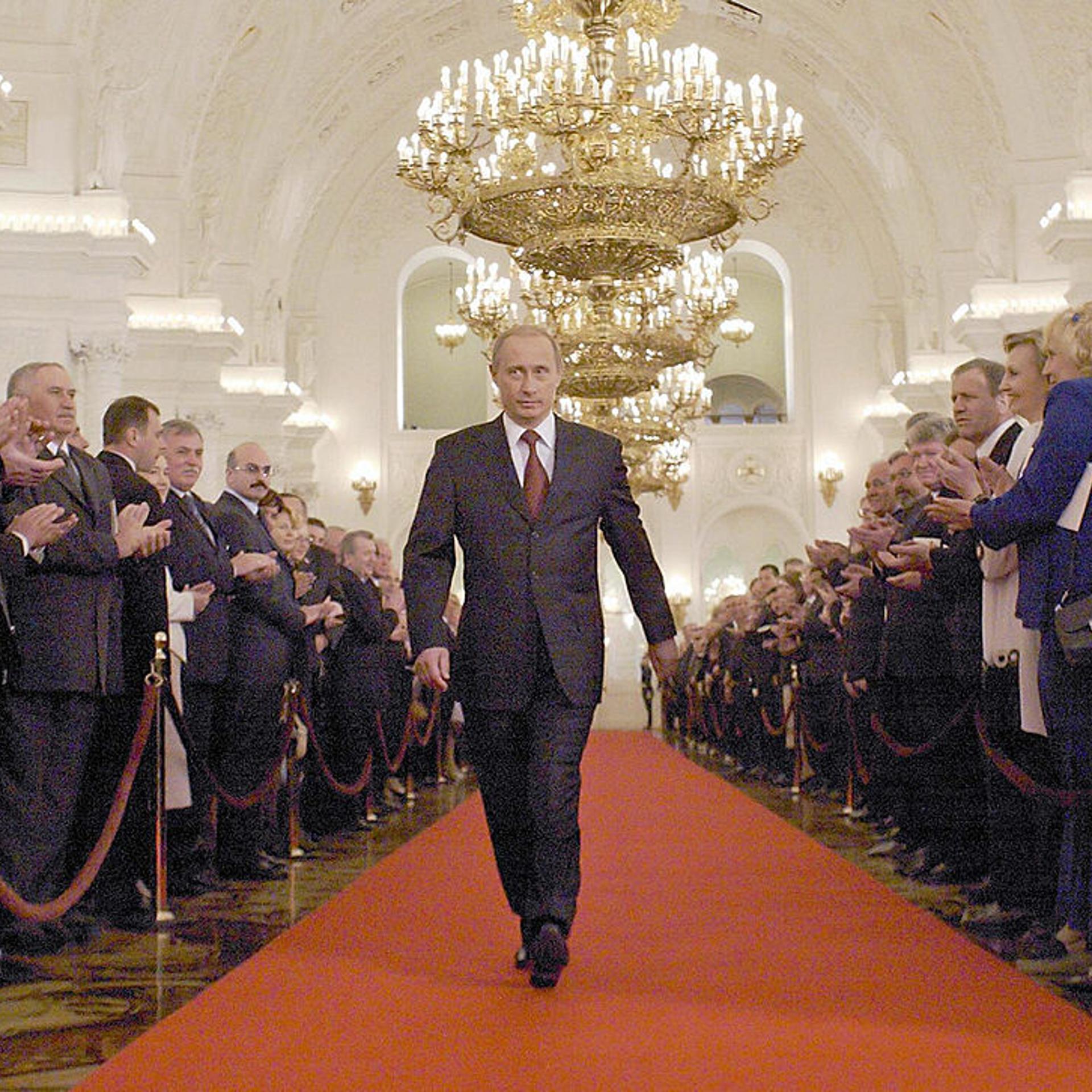 Russian President Vladimir Putin walks a