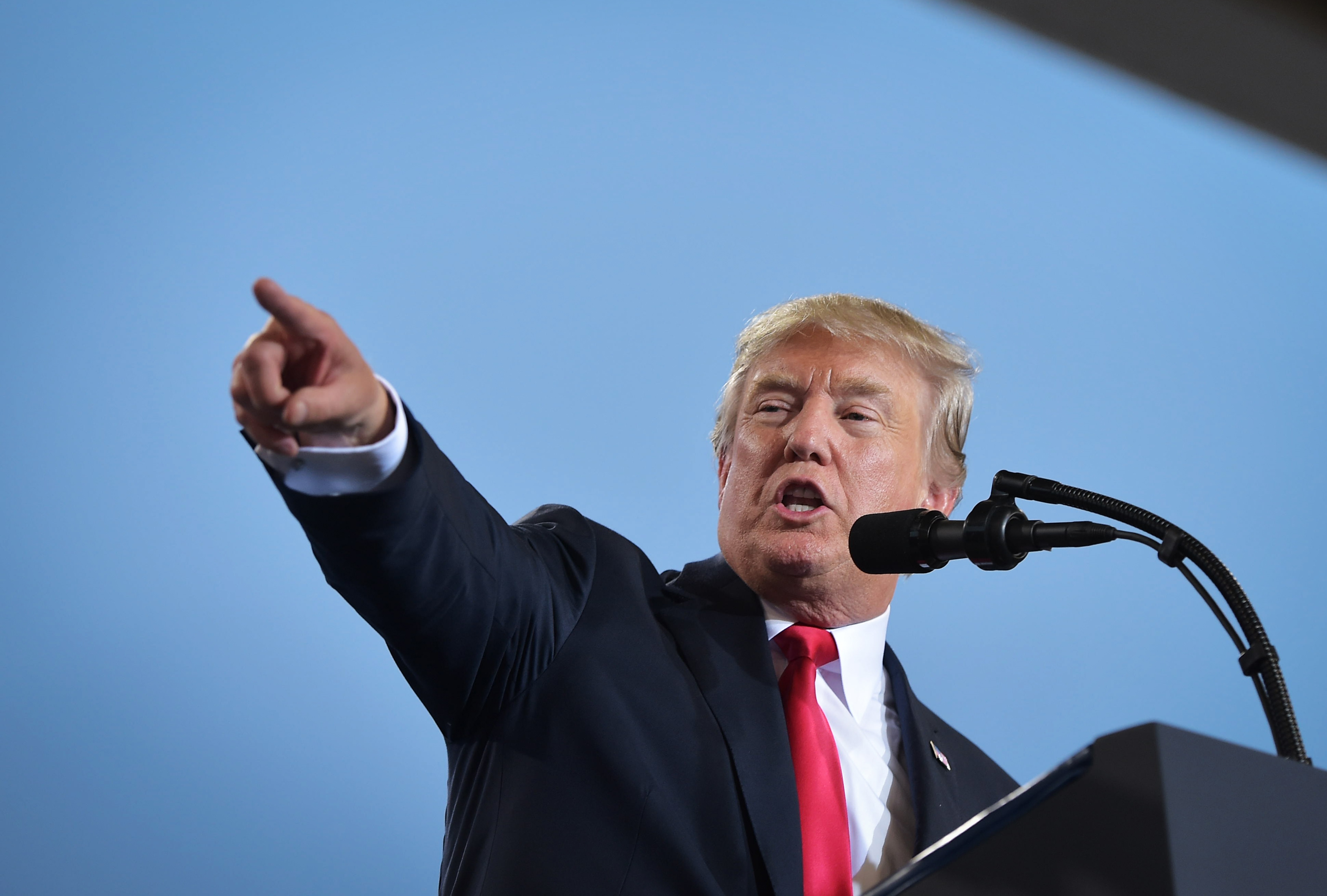 US President Donald Trump speaks on tax reform inside a hangar at the Harrisburg International Airport on October 11, 2017 in Middletown, Pennsylvania.