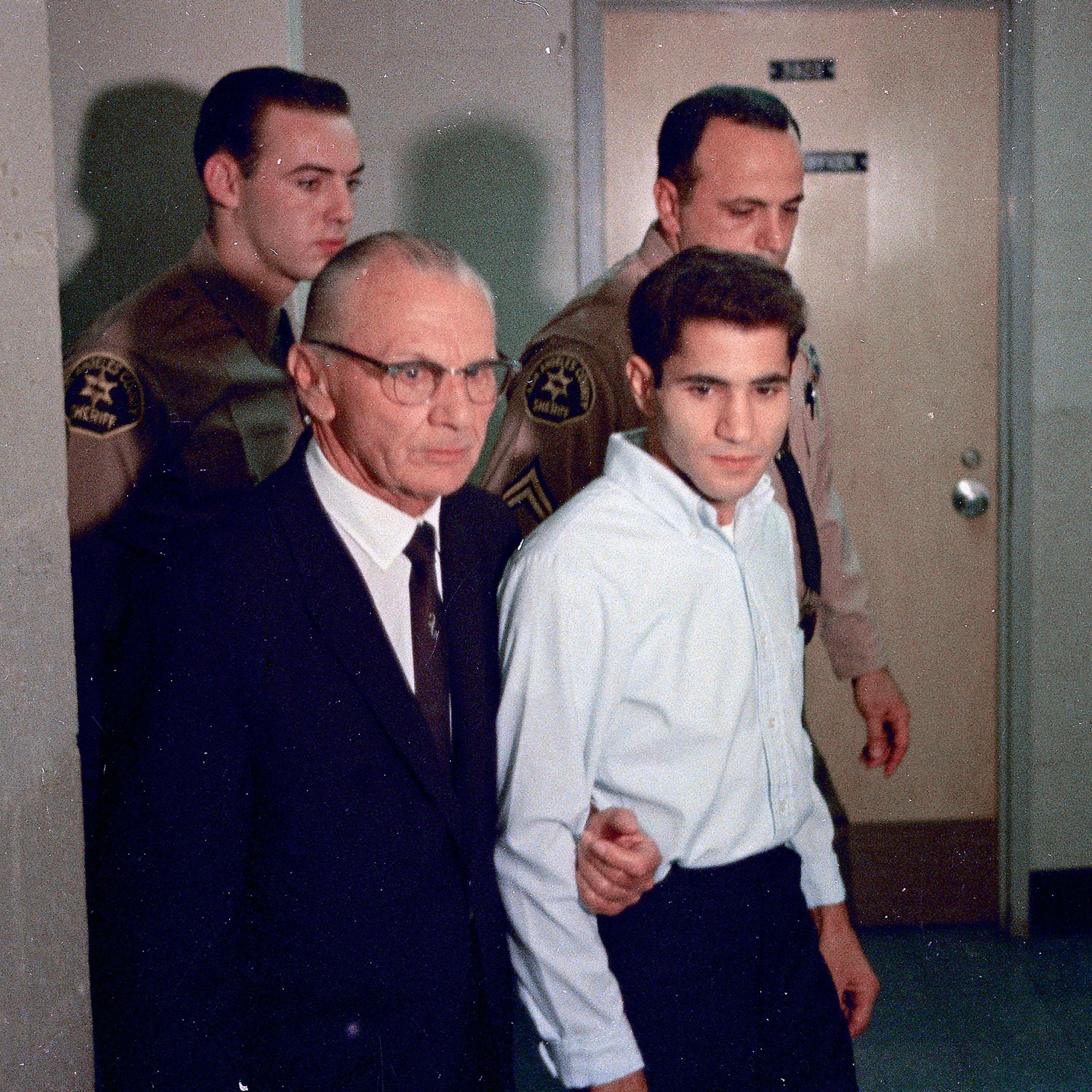 In this June 1968 file photo, Sirhan Sirhan, right, the assassin of Sen. Robert F. Kennedy, is seen with his attorney Russell E. Parsons in Los Angeles.