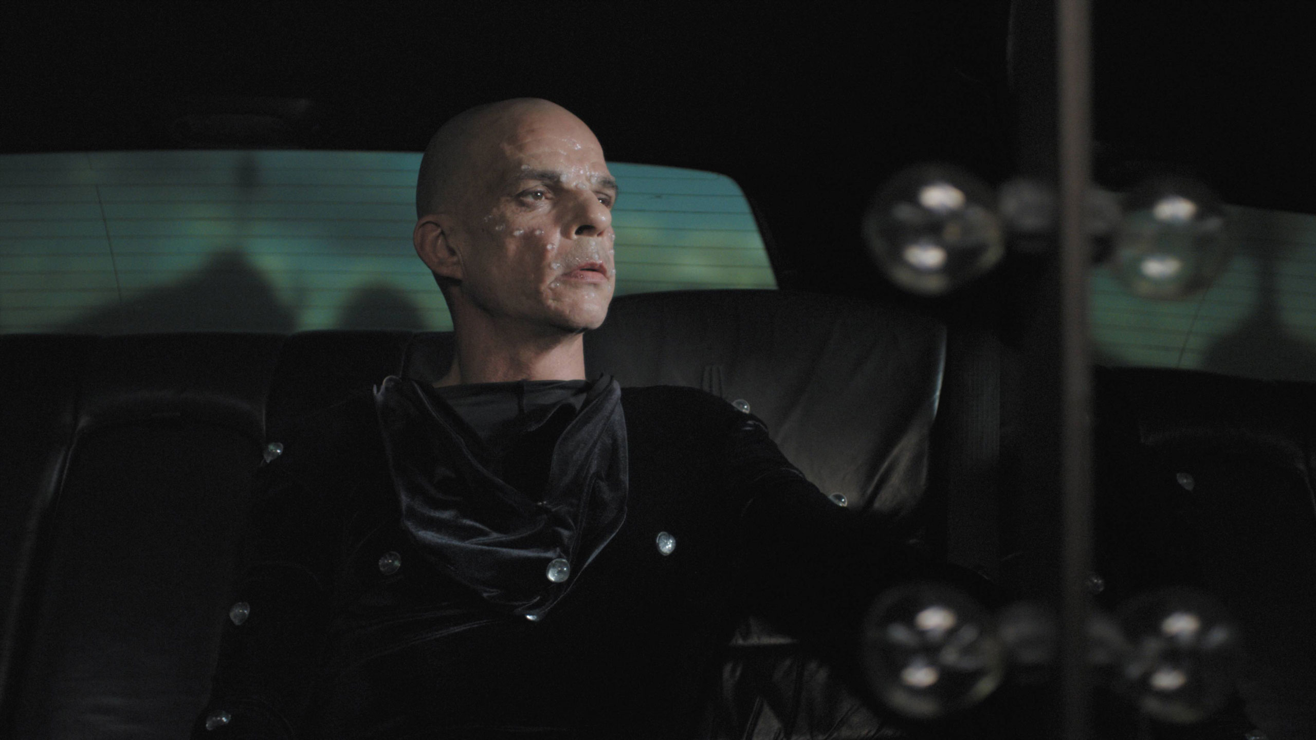 Still from HOLY MOTORS, Denis Lavant