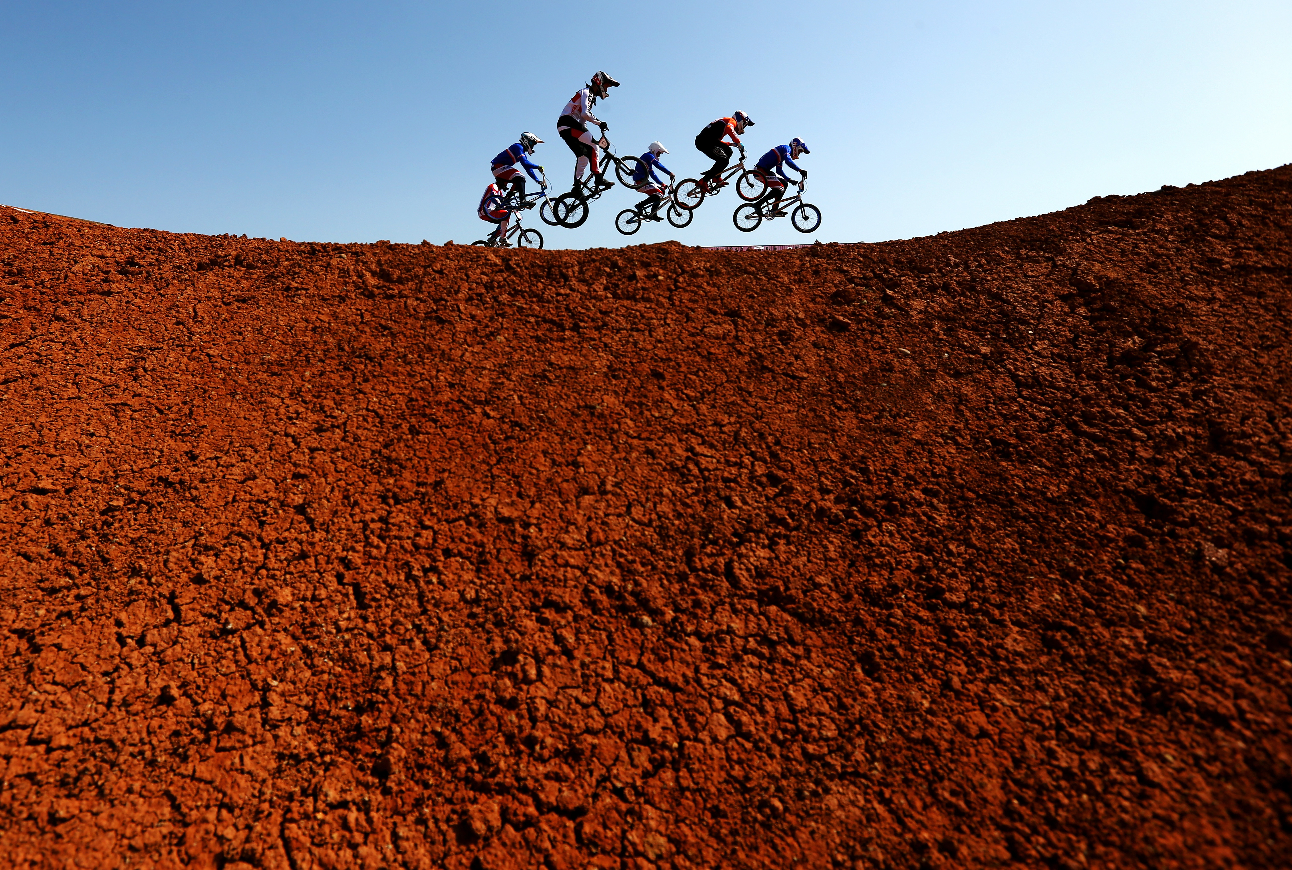 Competitors ride in the Men's Cycling BMX Final at the Baku European Games on June 28, 2015 in Baku, Azerbaijan.