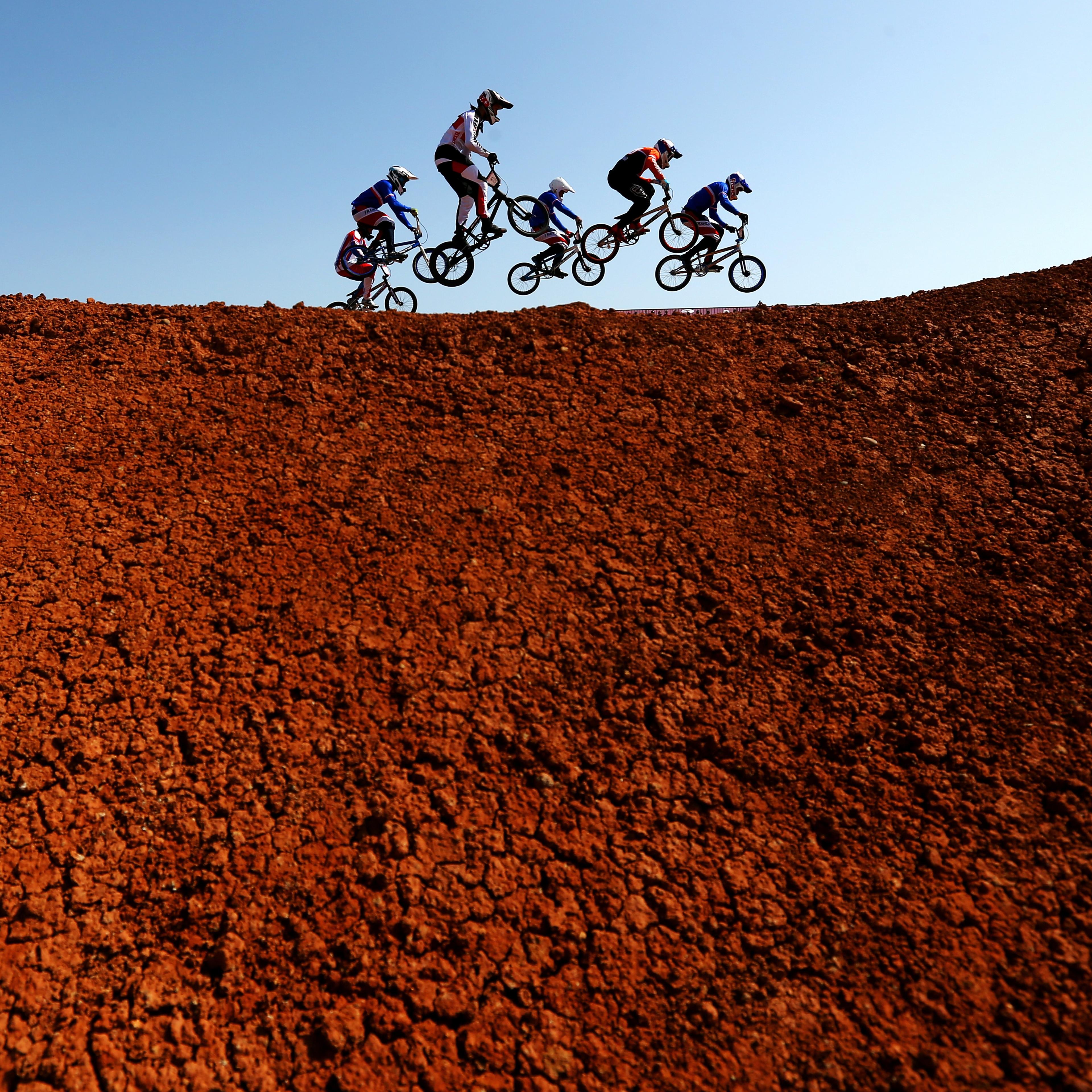 Competitors ride in the Men's Cycling BMX Final at the Baku European Games on June 28, 2015 in Baku, Azerbaijan.