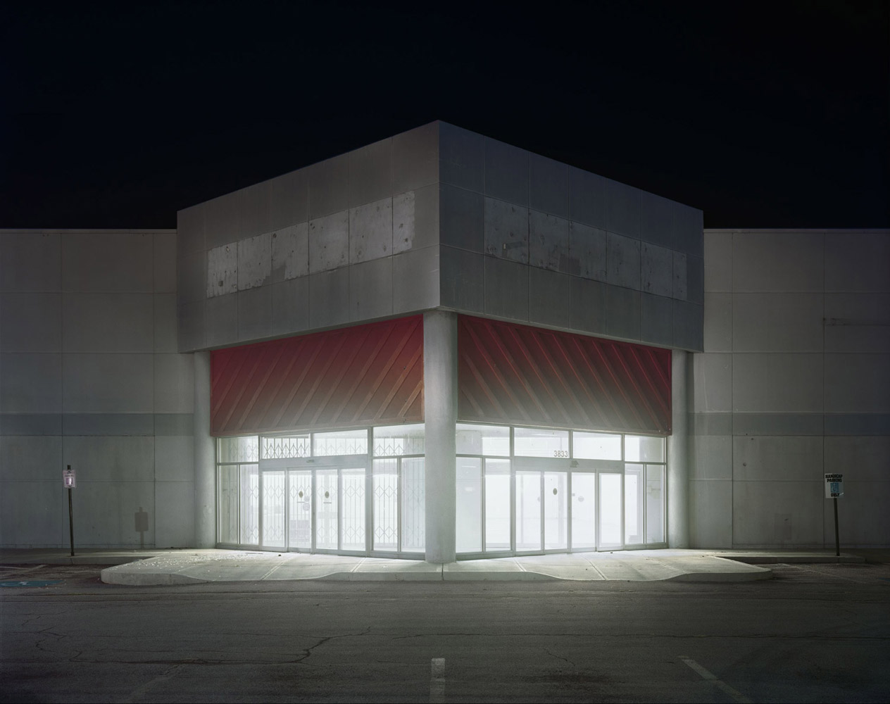 <i>Pep Boys, 2009</i><br> 
"At 1 a.m., after a long day, walking back to the car to pack up the camera, I looked back at this Pep Boys and cursed under my breath as I knew the picture would prolong sleep at least another hour. I woke the next day happy and tired."<br> 
<i>Caption comments courtesy of Brian Ulrich</i> 