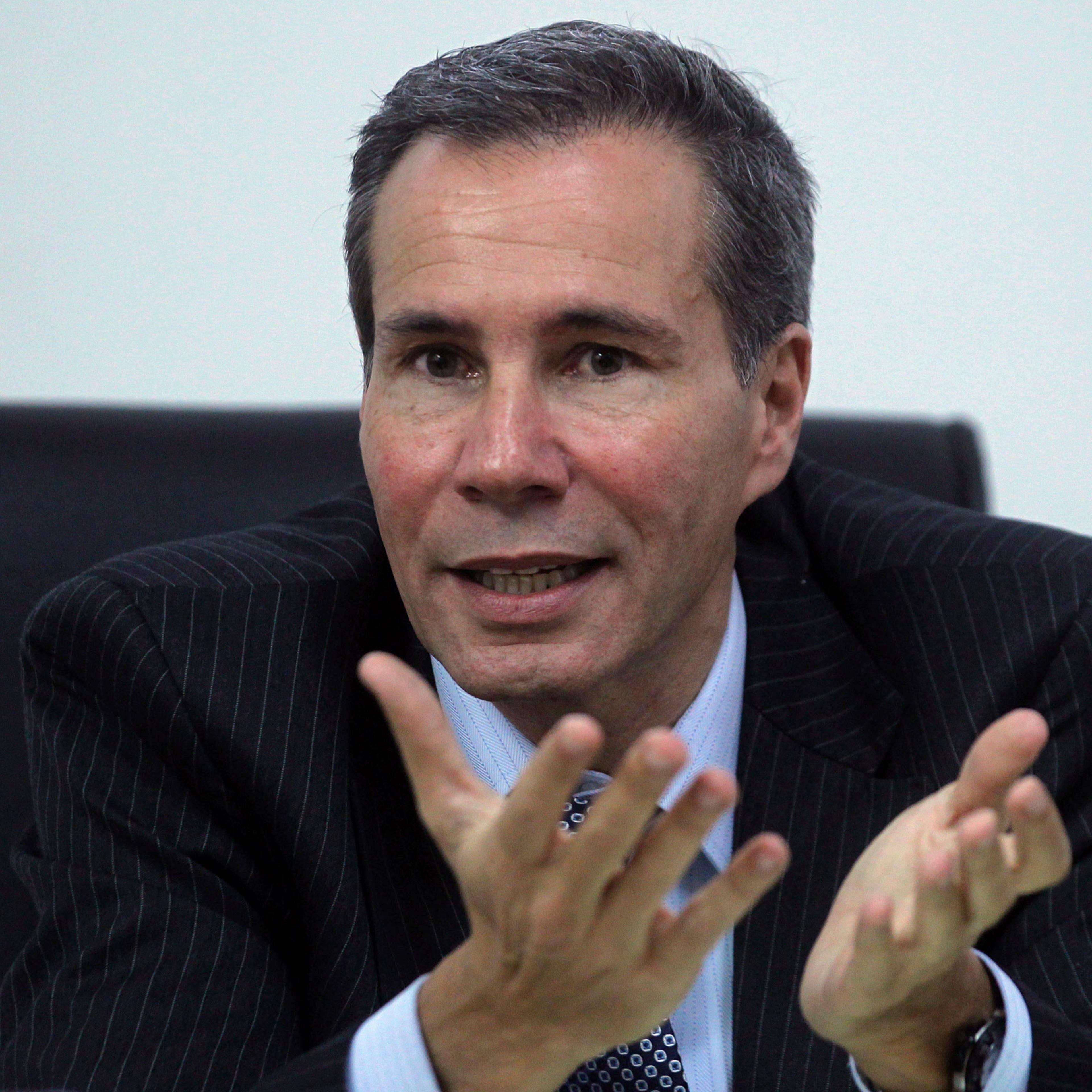 Argentine prosecutor Nisman, who is investigating the 1994 car-bomb attack on the AMIA Jewish community center, speaks during a meeting with journalists at his office in Buenos Aires