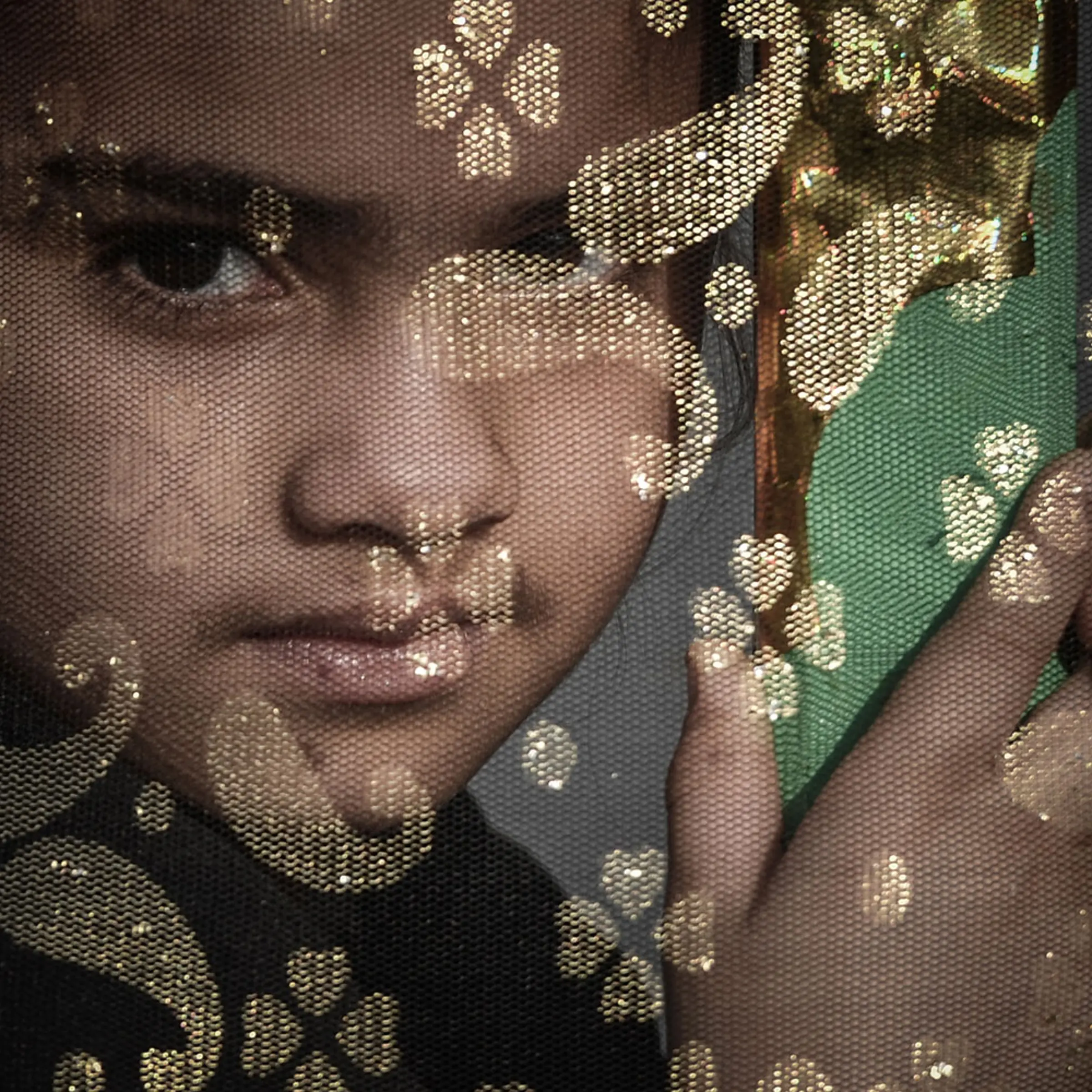 Jan. 3, 2013. A Bahraini Shiite Muslims girl watches the Arbaeen religious festival from a window in the village of Sanabis, west of Manama.