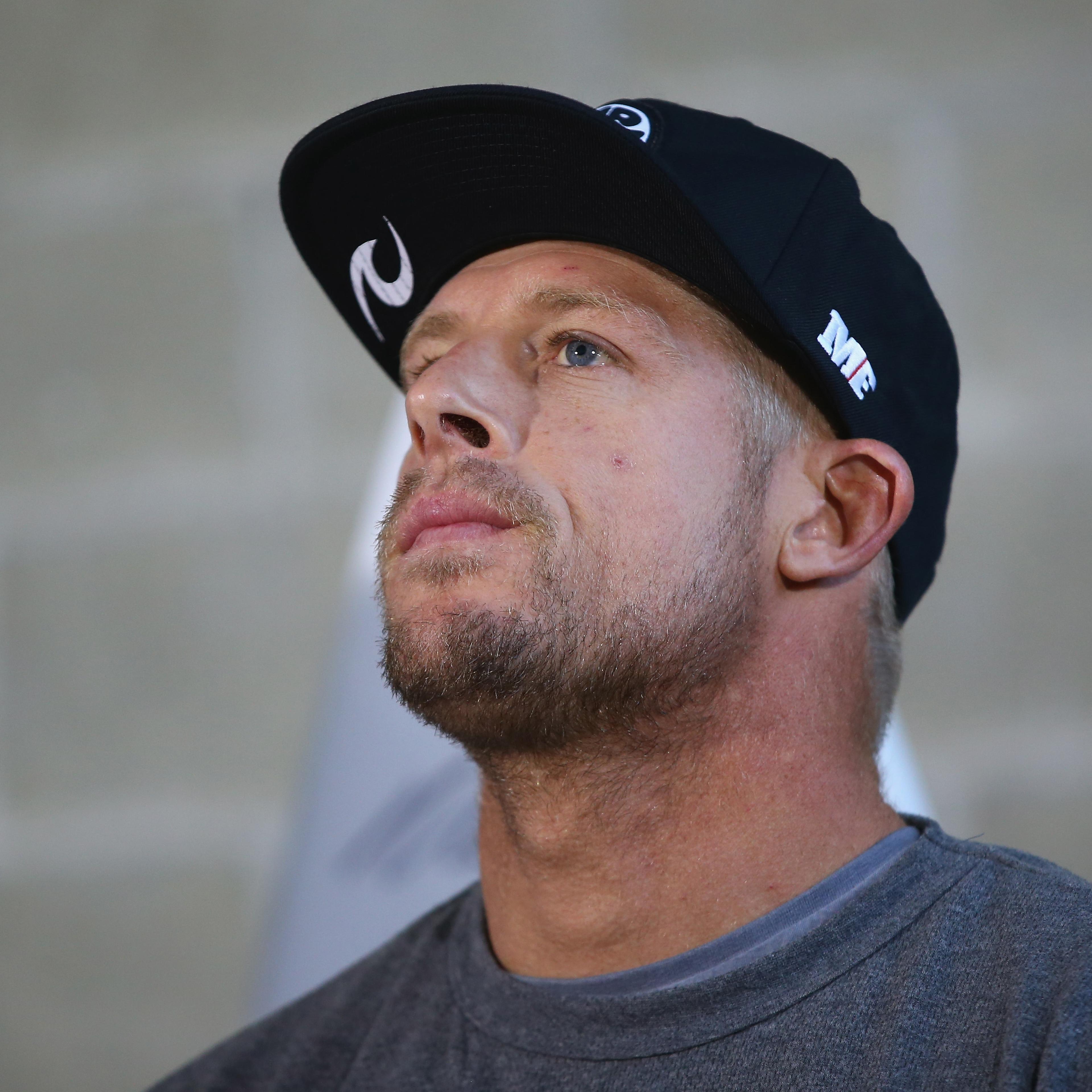 Mick Fanning Arrives In Australia After Shark Attack
