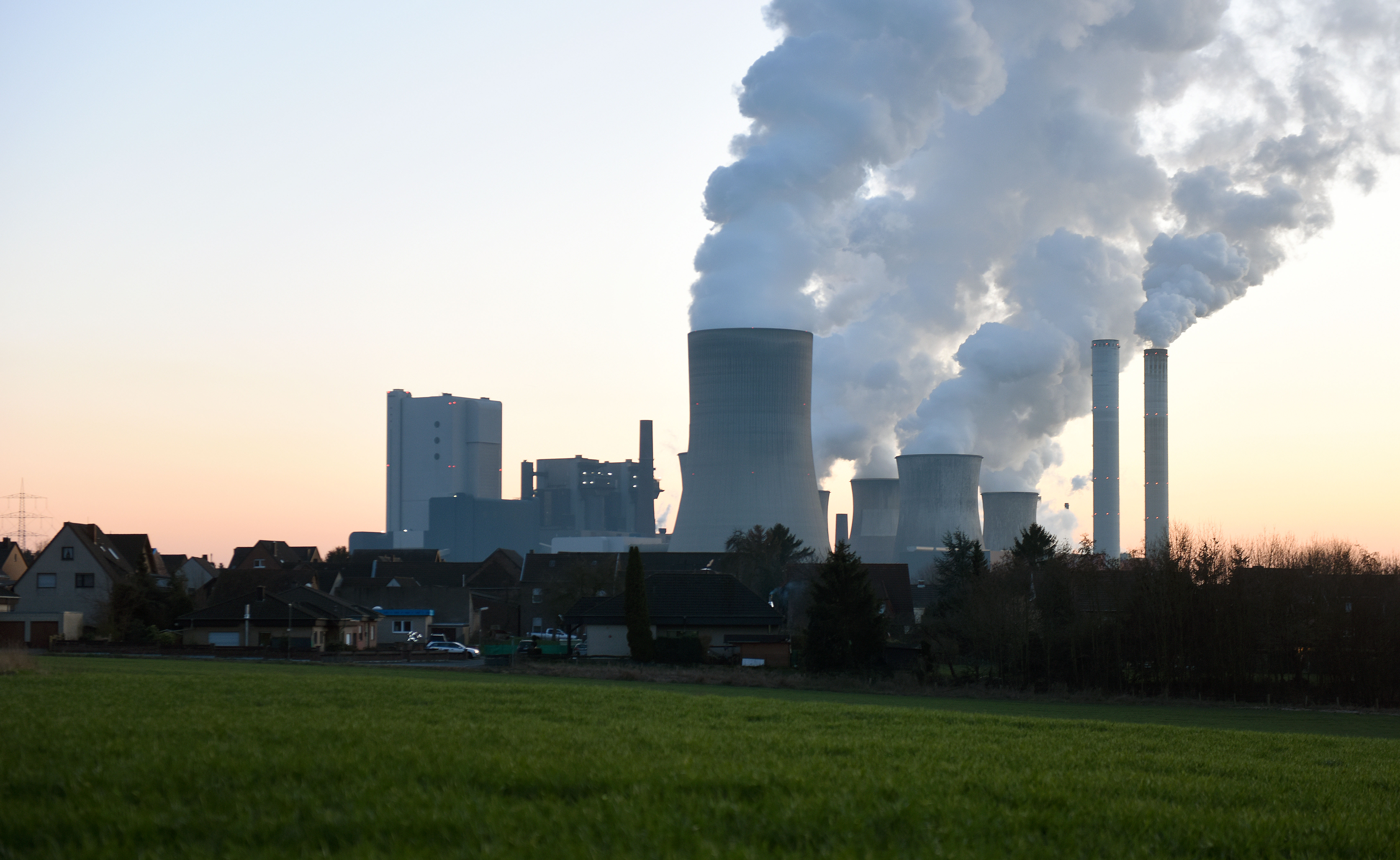 Steam rises from cooling towers at the RWE Niederaussem coal-fired power plant on February 16, 2016 near Bergheim, Germany.