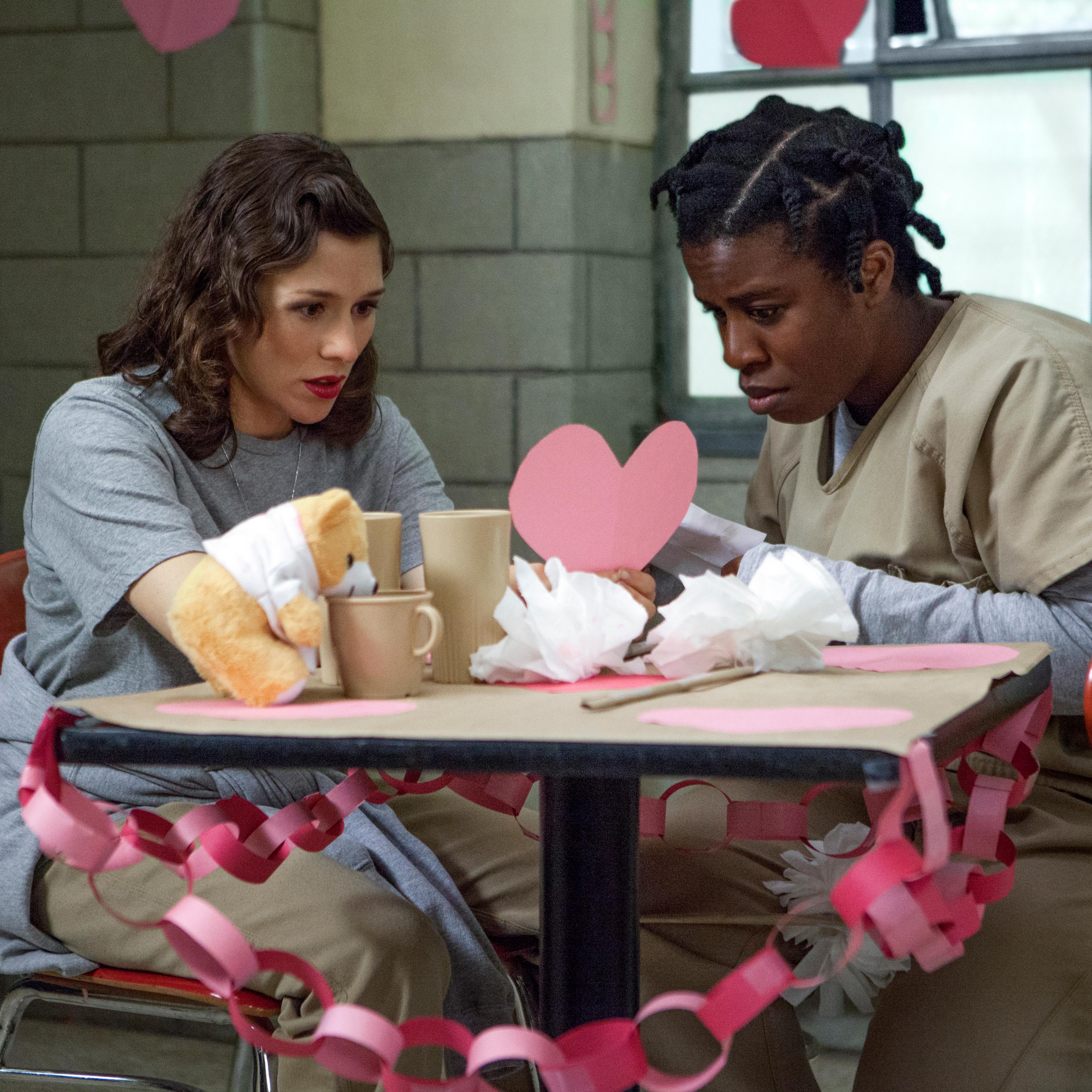 Yael Stone and Uzo Aduba in a scene from Netflix’s “Orange is the New Black” Season 2.