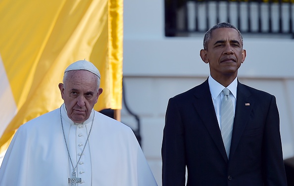 US President Barack Obama welcomes Pope Francis to the White House on September 23, 2015 in Washington,DC. President Barack Obama hosts Pope Francis at the White House for the first time Wednesday, warmly embracing the Catholic pontiff seen as both a mor