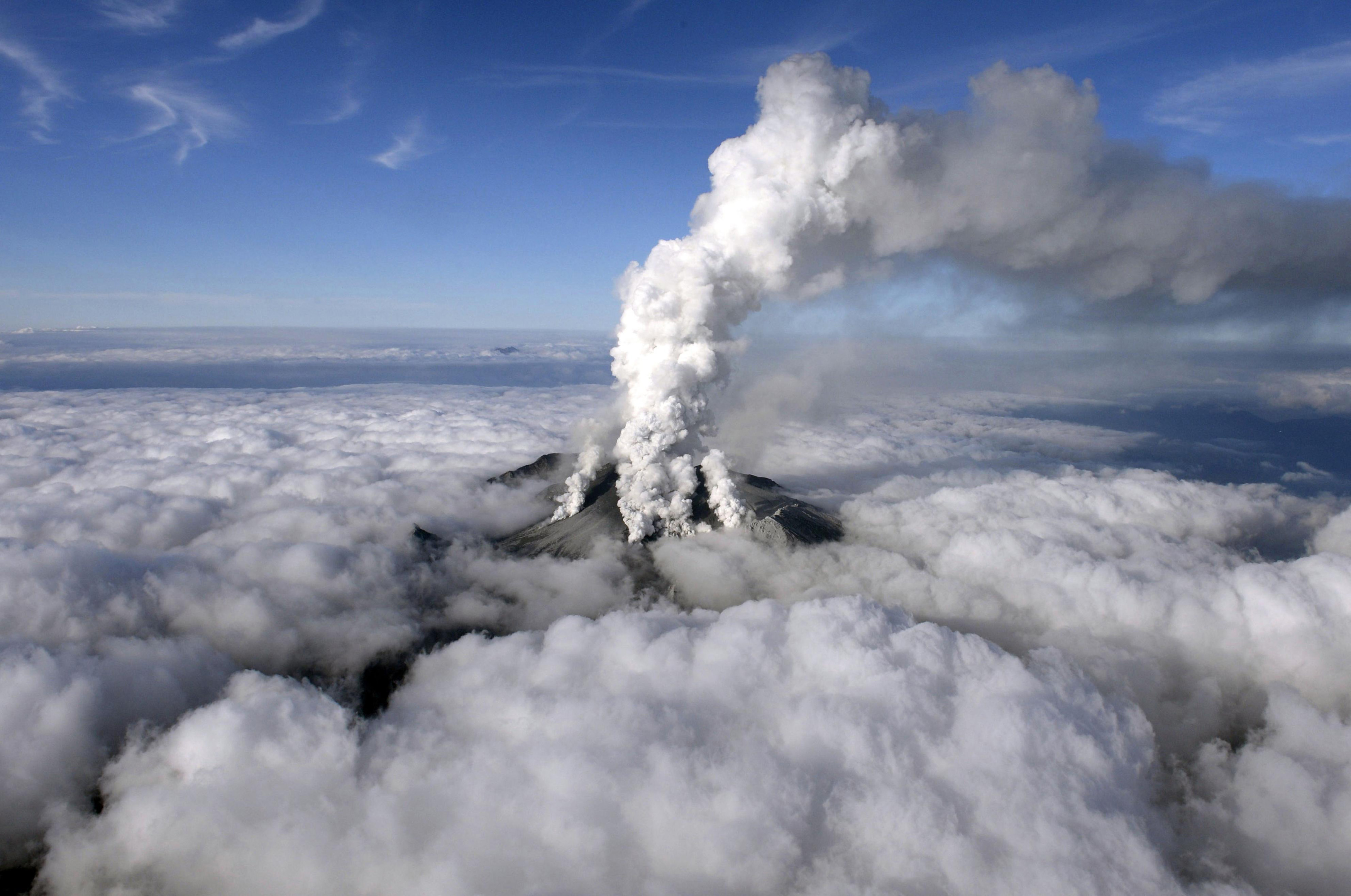 Volcanic smoke rises from Mount Ontake, which straddles Nagano and Gifu prefectures, central Japan on Sept. 27, 2014.