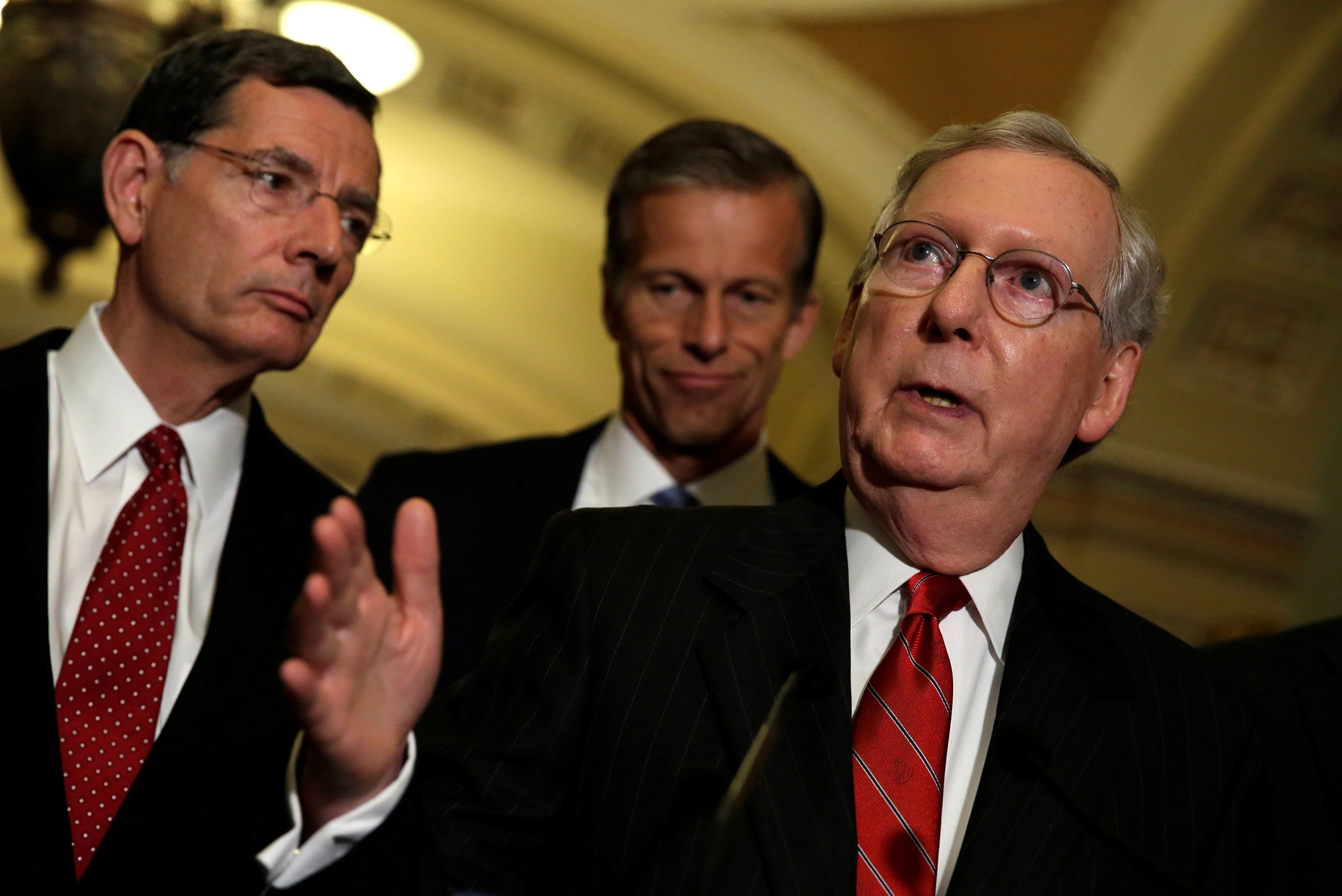 Mitch McConnell talks to the media after a weekly Senate Republican luncheon on Capitol Hill in Washington, June 7, 2016.