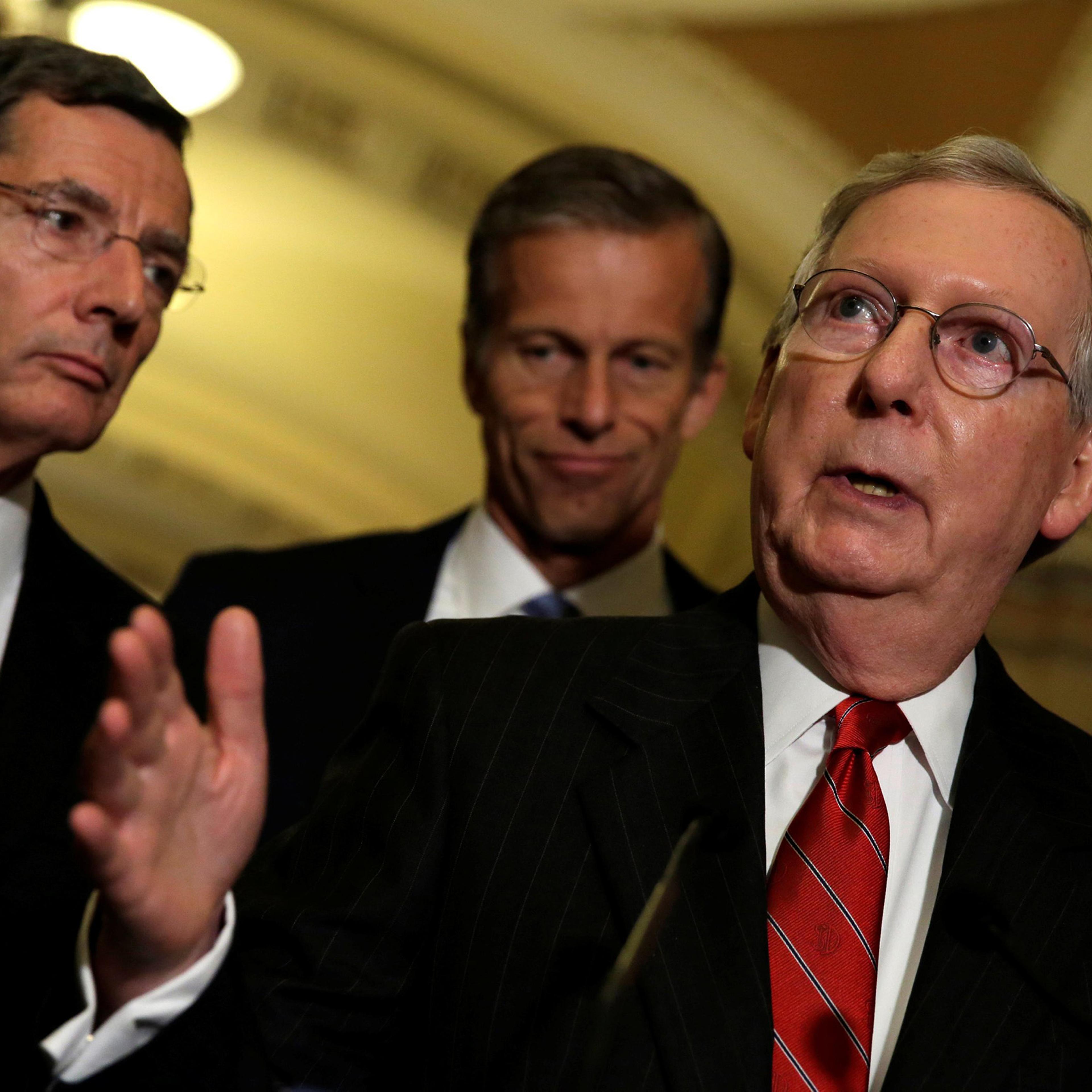 Mitch McConnell talks to the media after a weekly Senate Republican luncheon on Capitol Hill in Washington, June 7, 2016.