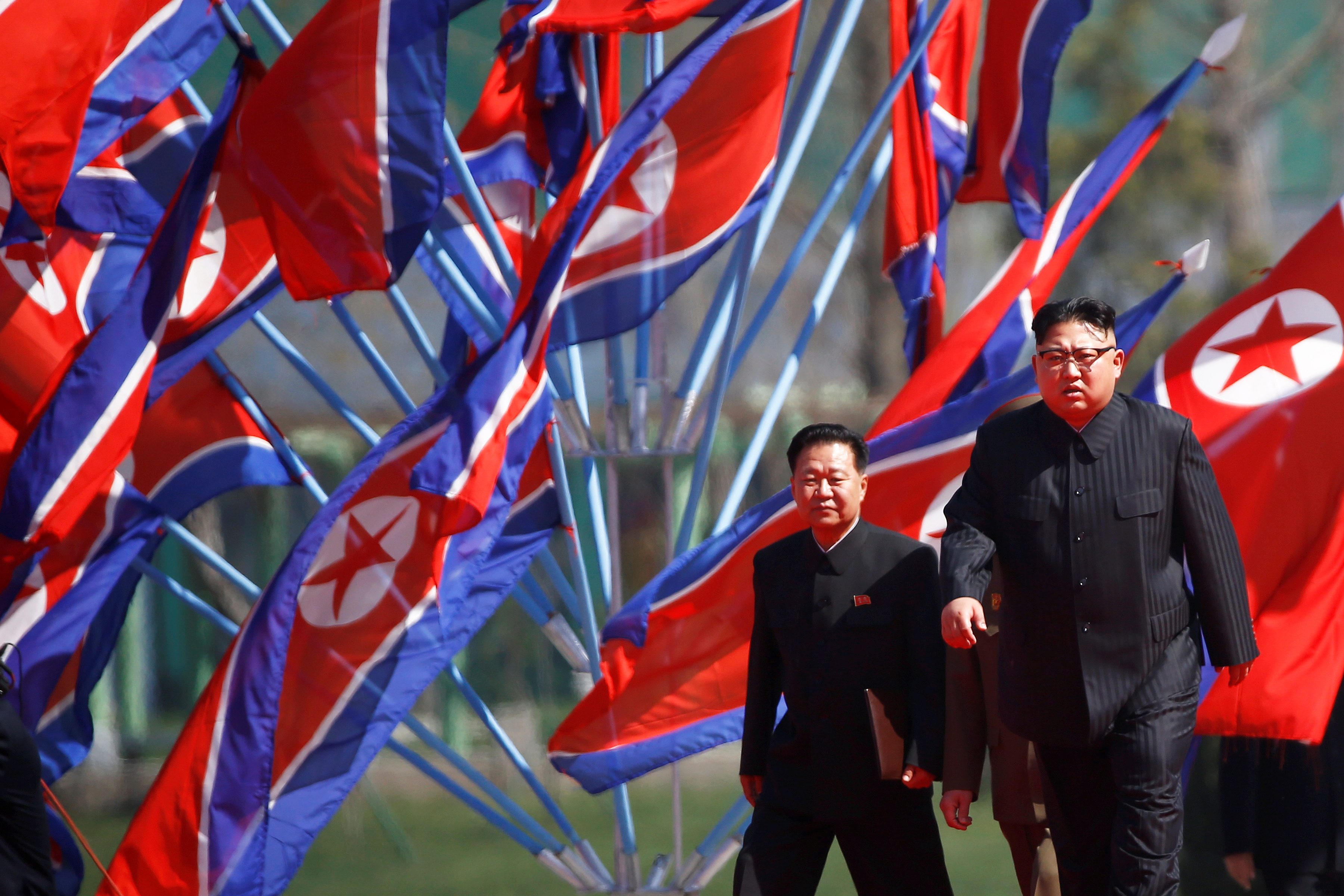 North Korean leader Kim Jong Un arrives for an opening ceremony of a newly constructed residential complex in Ryomyong street in Pyongyang
