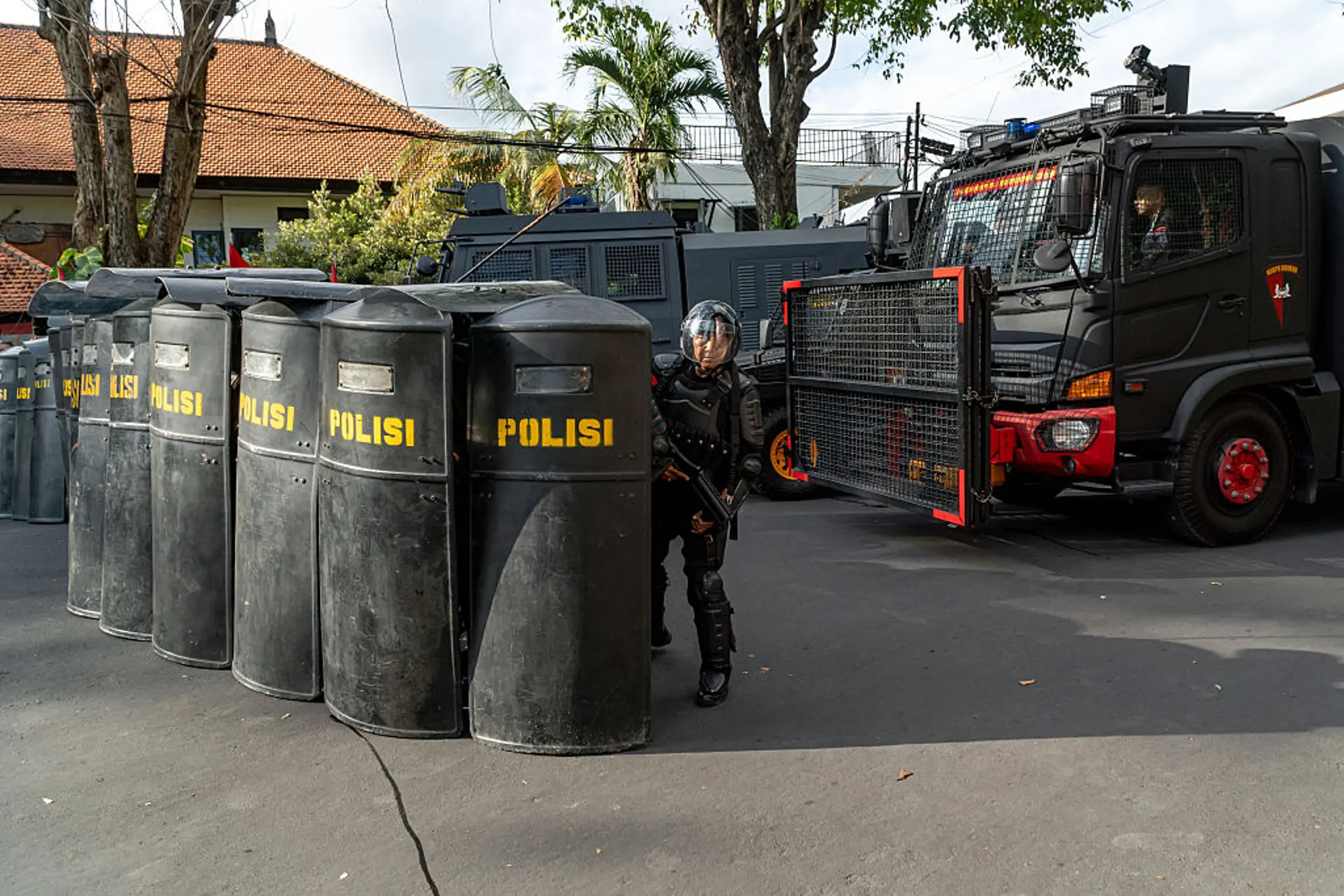 Police officers set up defensive formations during a protest in Denpasar, Bali, Indonesia on Aug. 30, 2025.