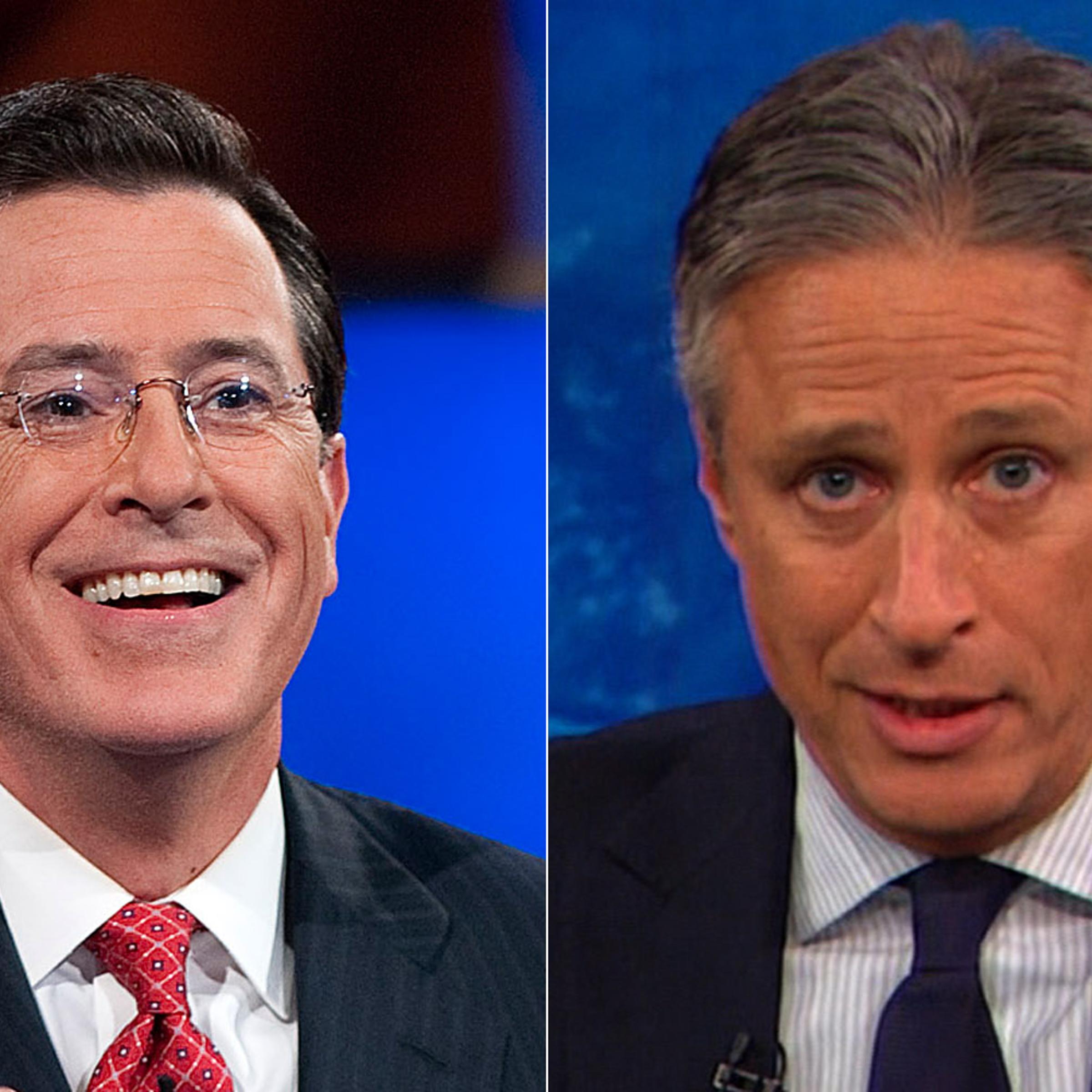 From left to right, Stephen Colbert and Jon Stewart.