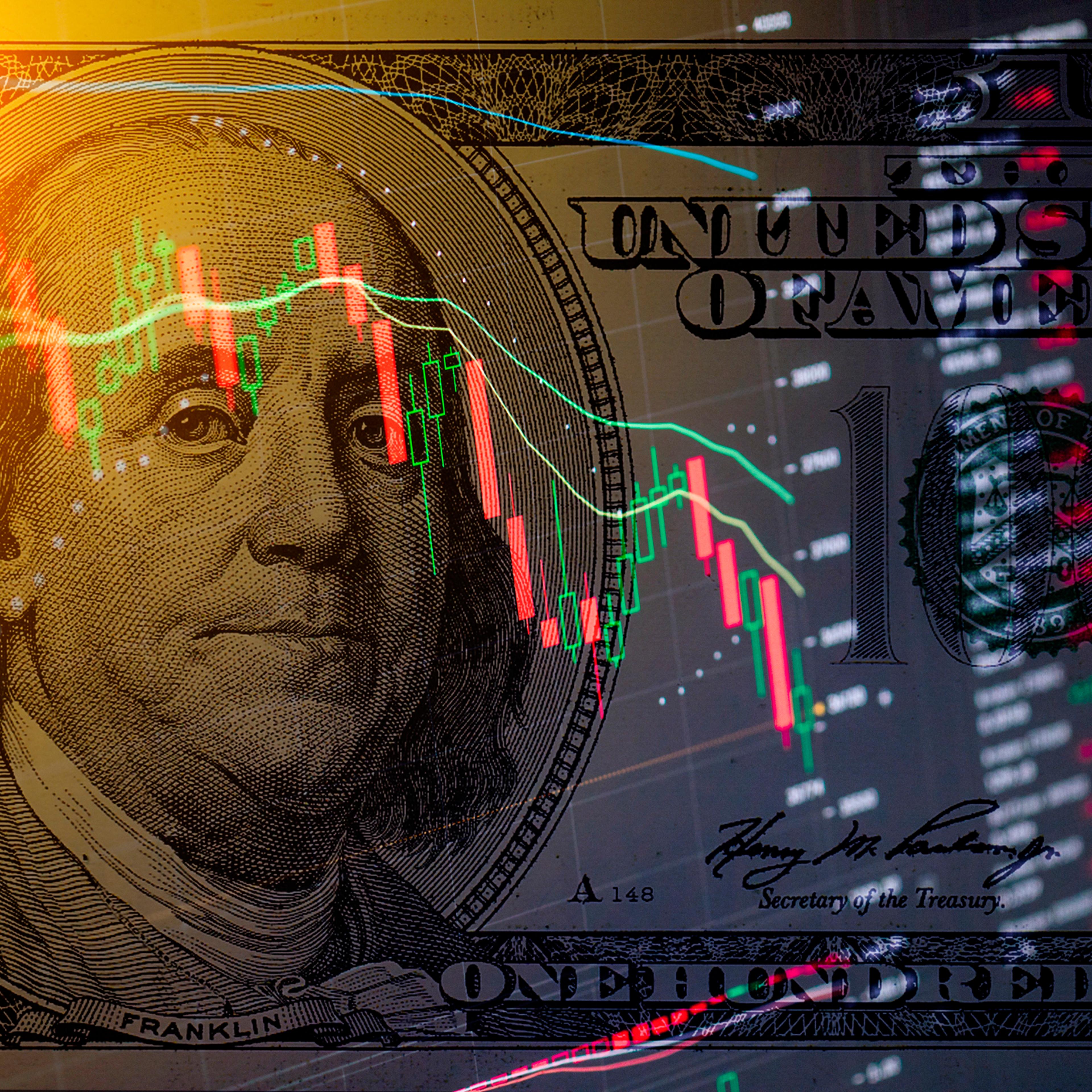 One hundred dollar bill on the background of stock data