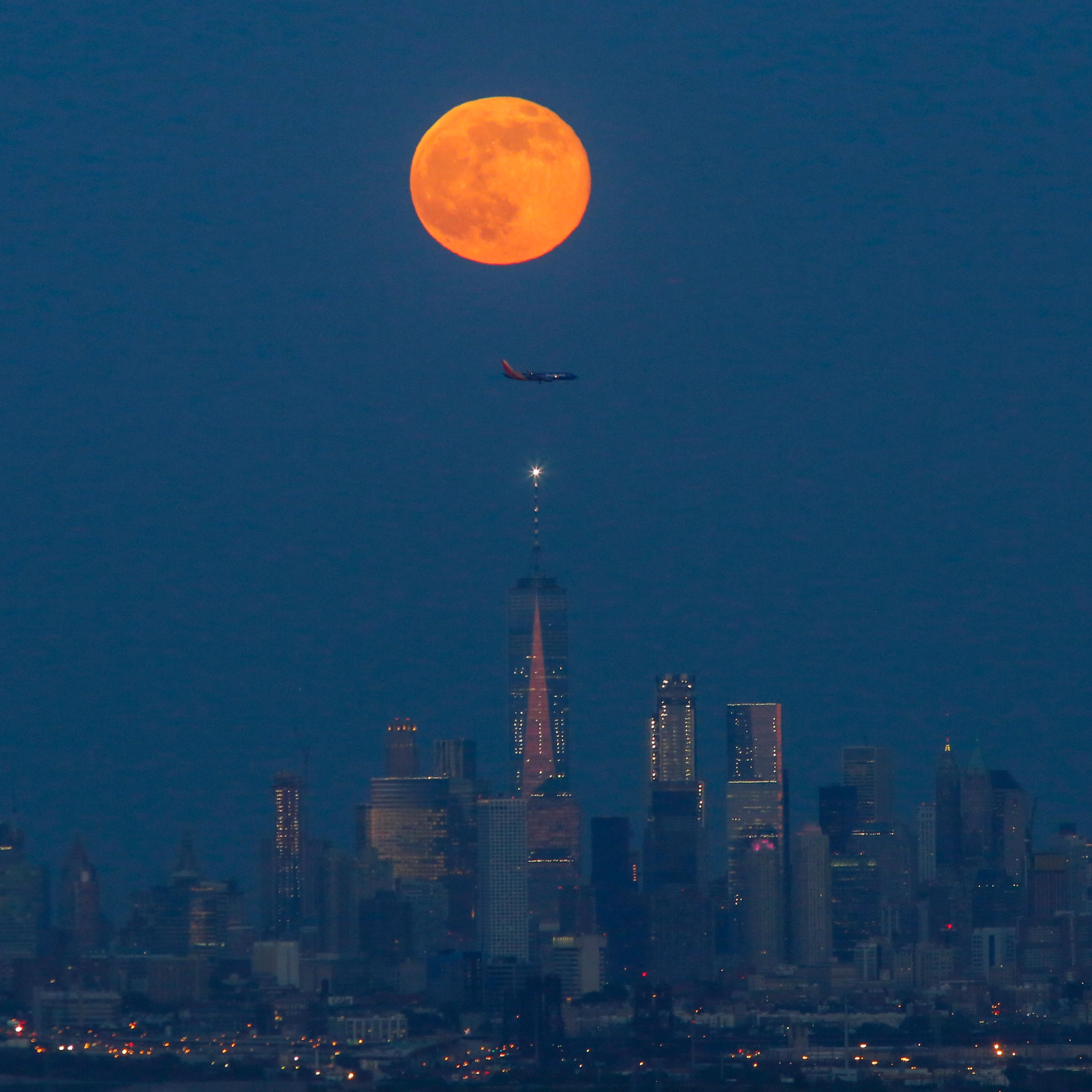 Strawberry Moon rises over New York City