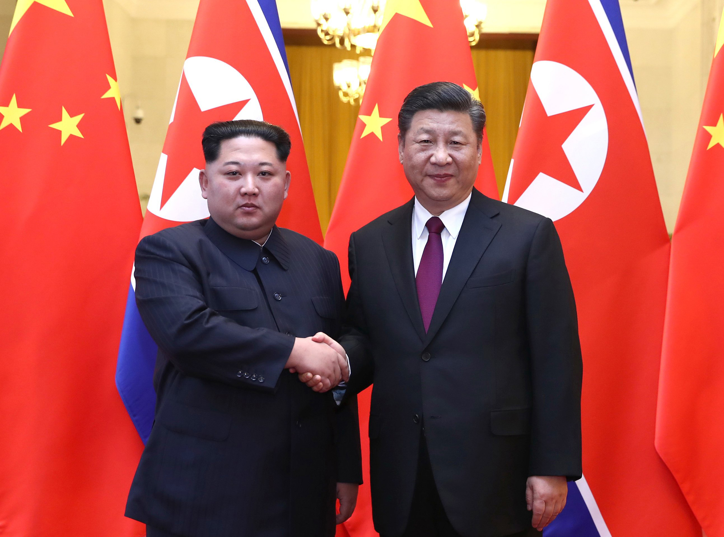 kim-jong-un-xi-jinping-meeting-beijing