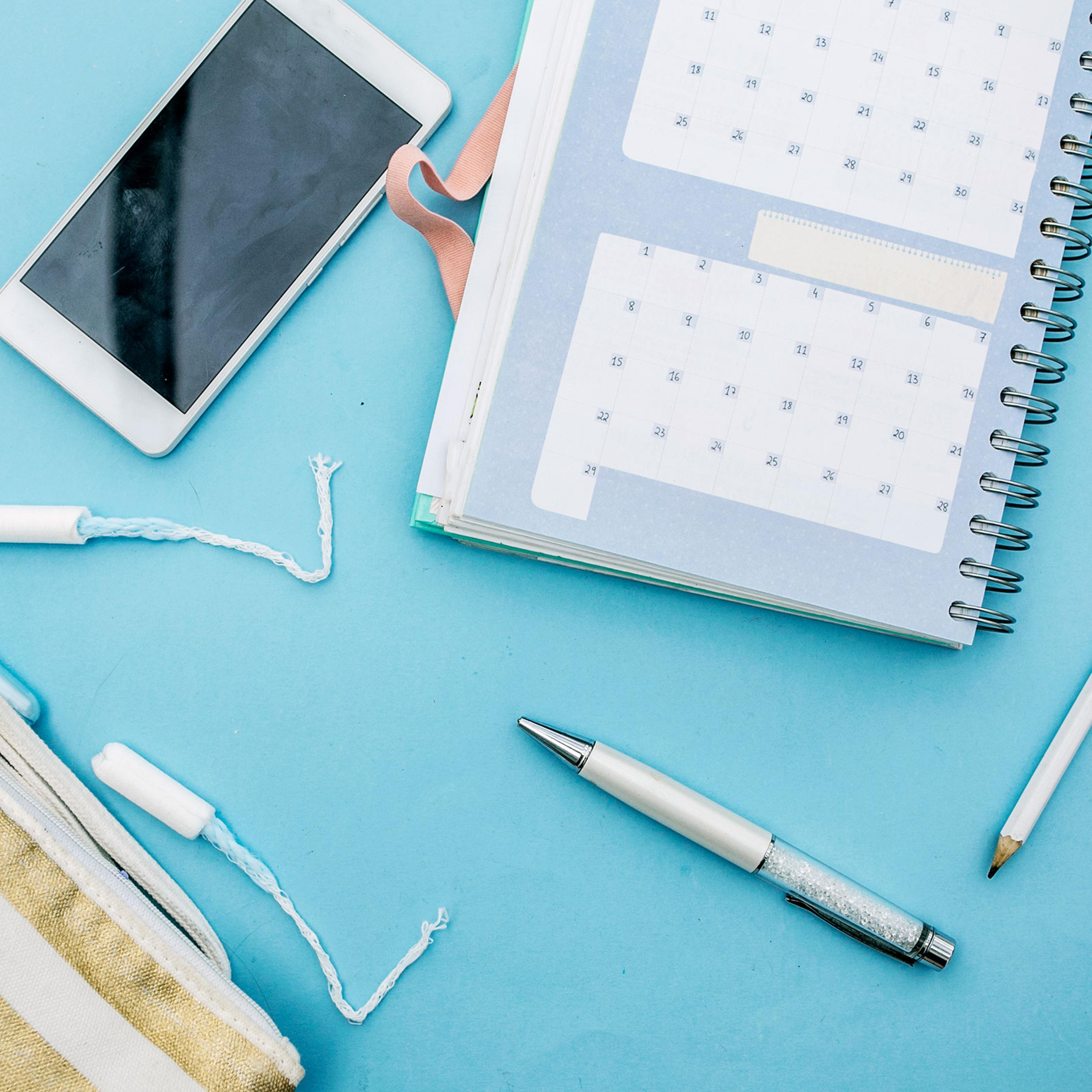 Tampon and Calendar in blue background